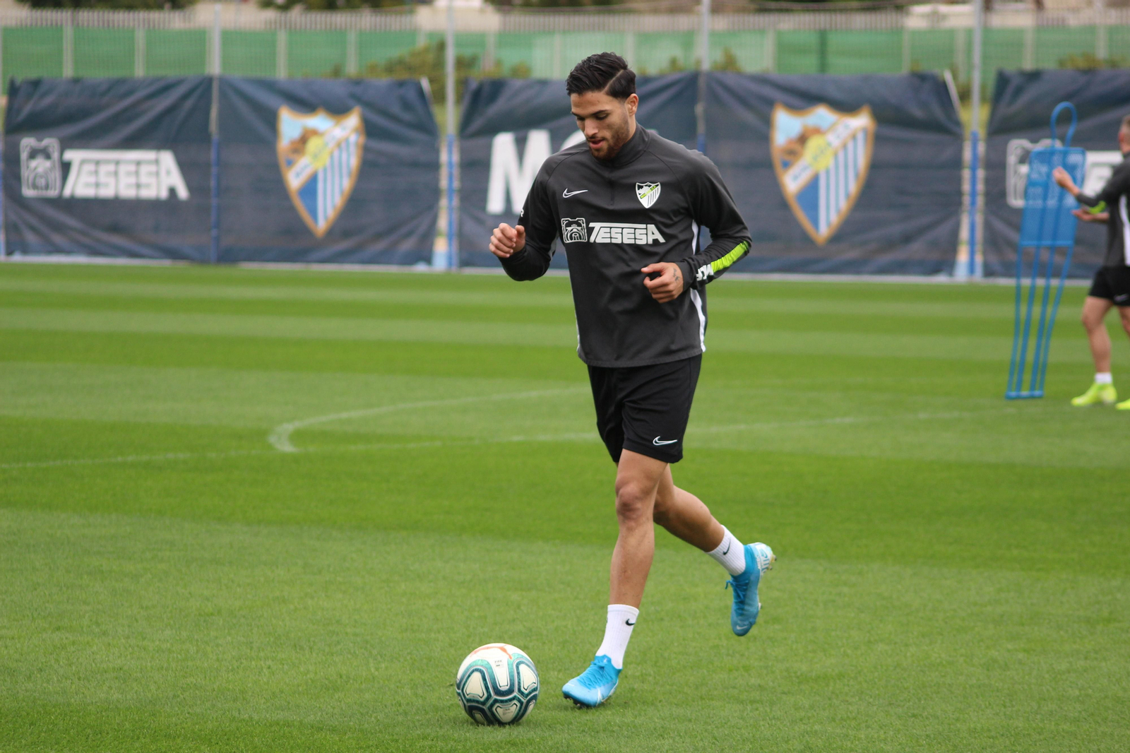 La vuelta a los entrenamientos del Málaga, en fotos