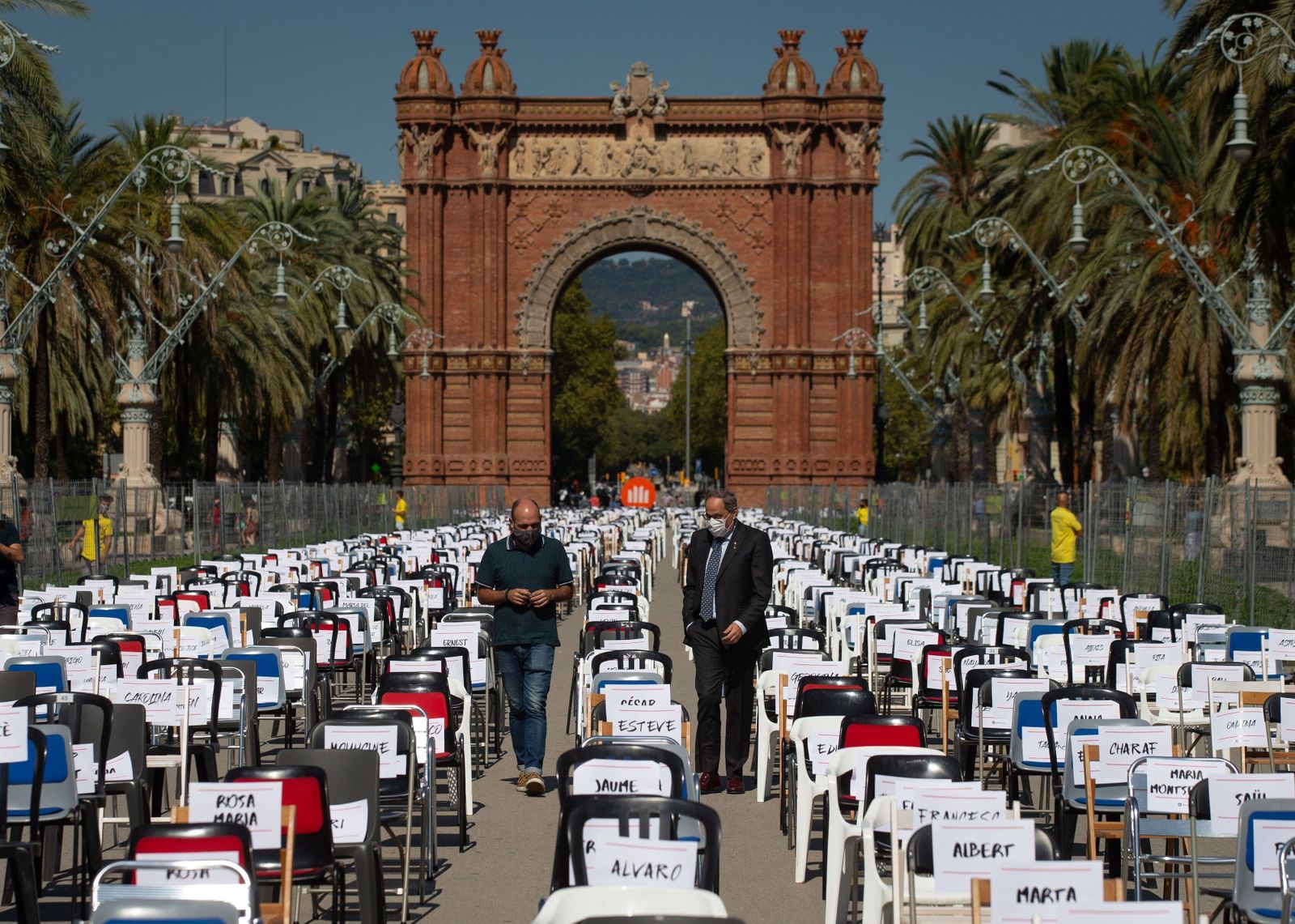 El ex presidente de la Generalitat Quim Torra (d), durante un acto de Òmnium Cultural la pasada Diada.