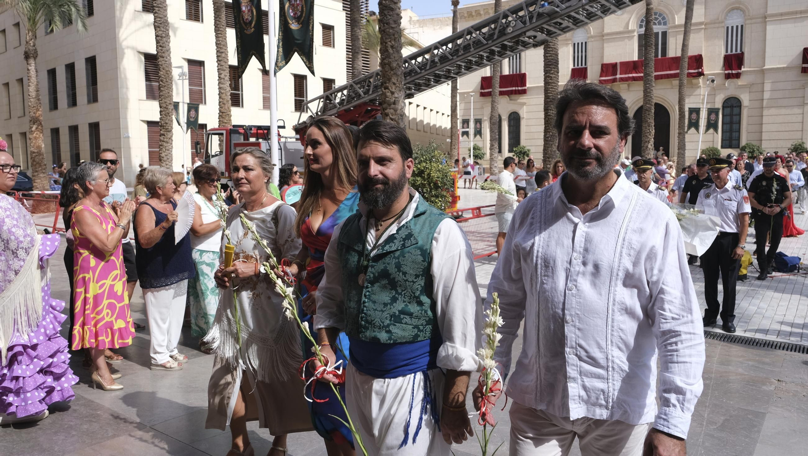 Ofrenda floral a la Virgen del Mar en la Feria de Almería 2024, en imágenes