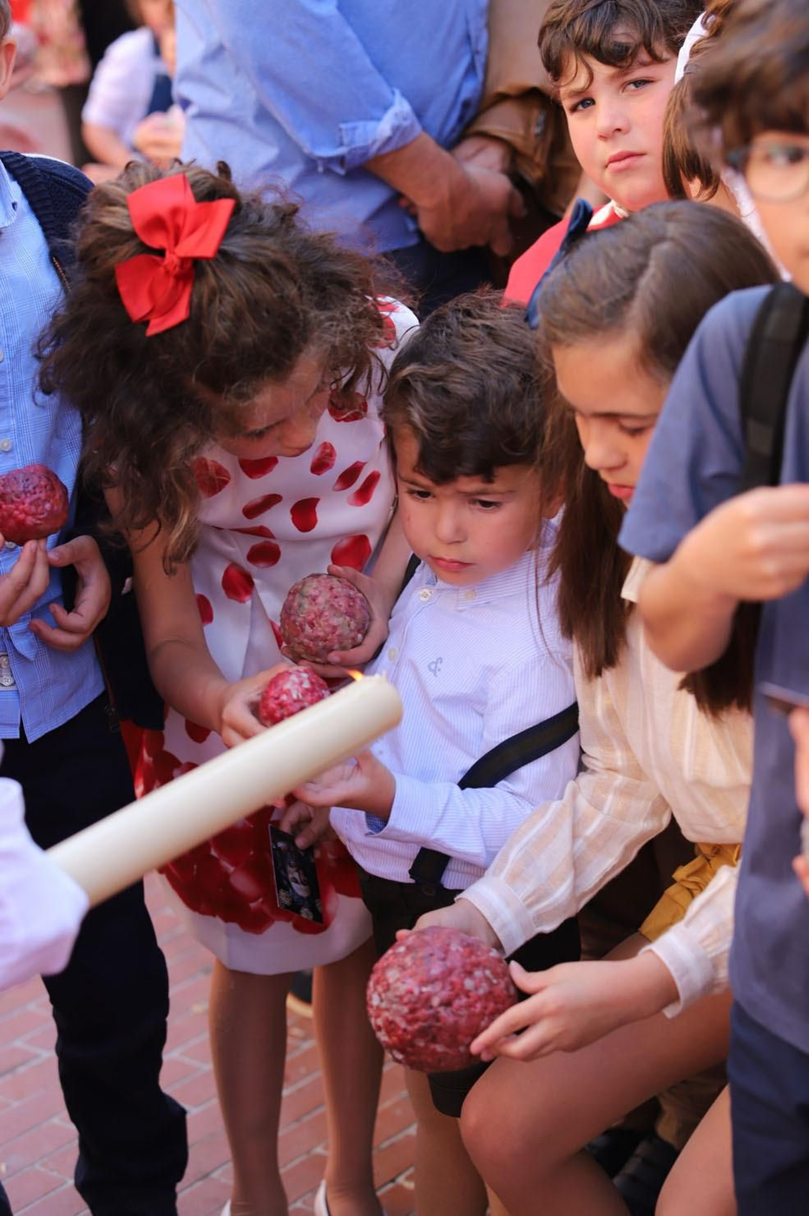 Imágenes del recorrido de la Borriquita  por las calles de Huelva