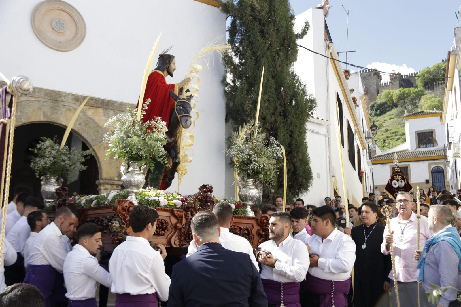 La procesión de la Borriquita en Almodóvar del Río, en imágenes
