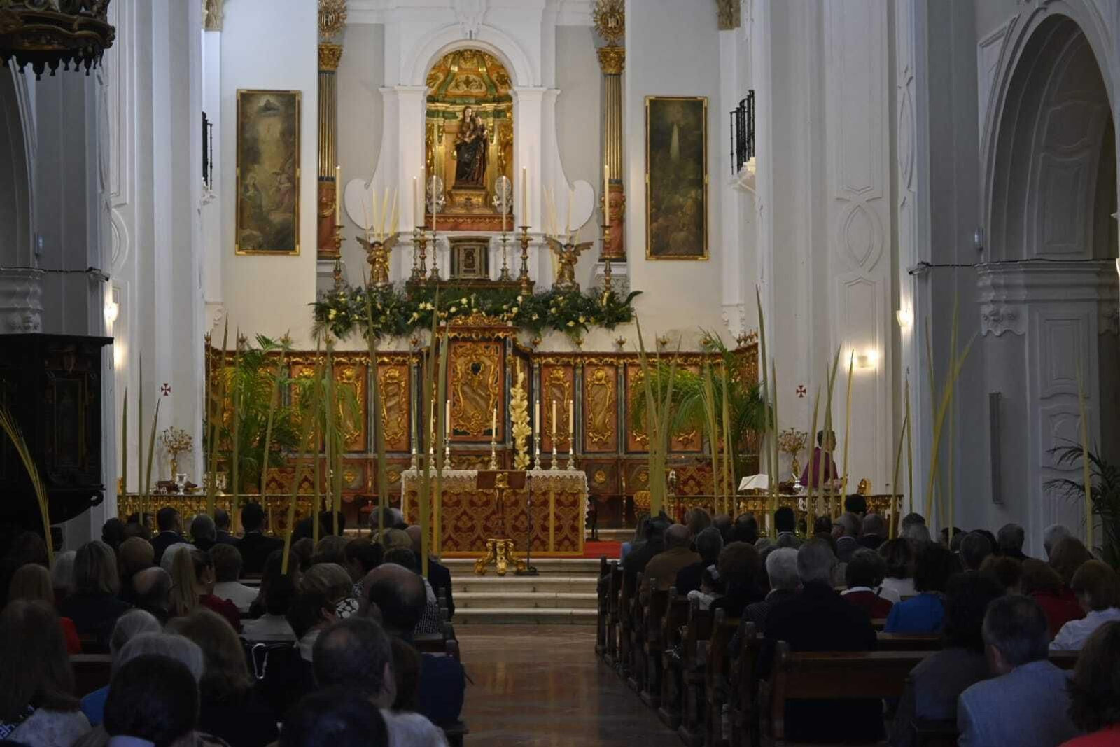 Misa y procesión de Palmas del Domingo de Ramos de Huelva en imágenes