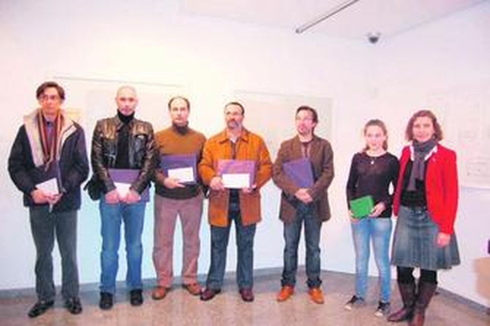 Premiados en el Rallye Fotográfico, cuya selección de obras complementan la muestra.