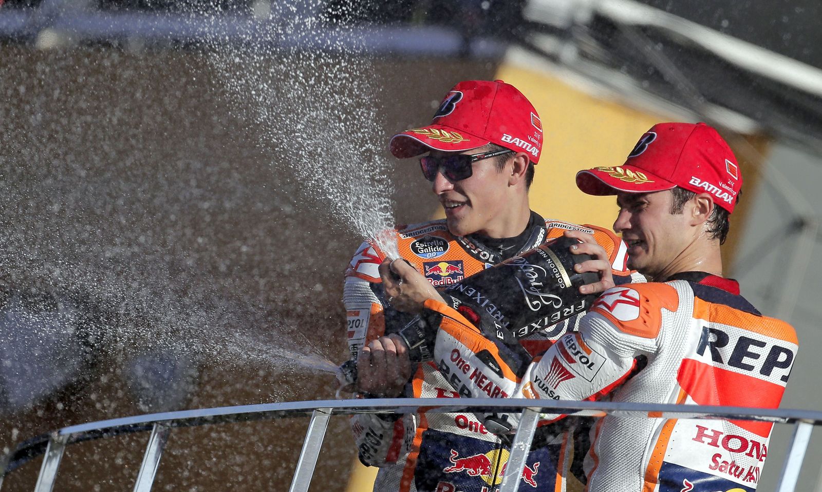 Pedrosa, junto a su compañero Márquez.