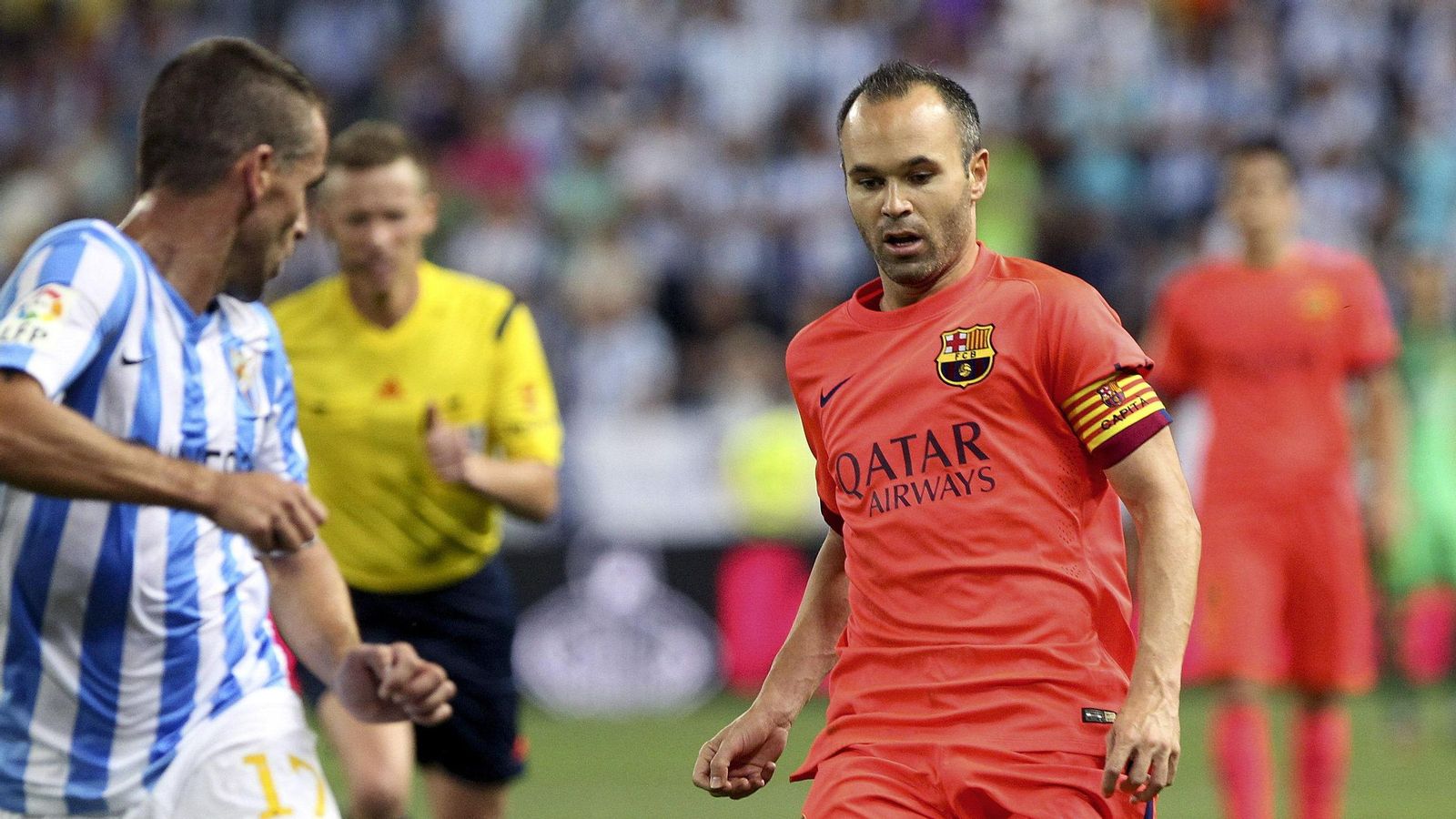 Las fotos de Andrés Iniesta en La Rosaleda con España y el Barcelona Las fotos de Andrés Iniesta en La Rosaleda con España y el Barcelona