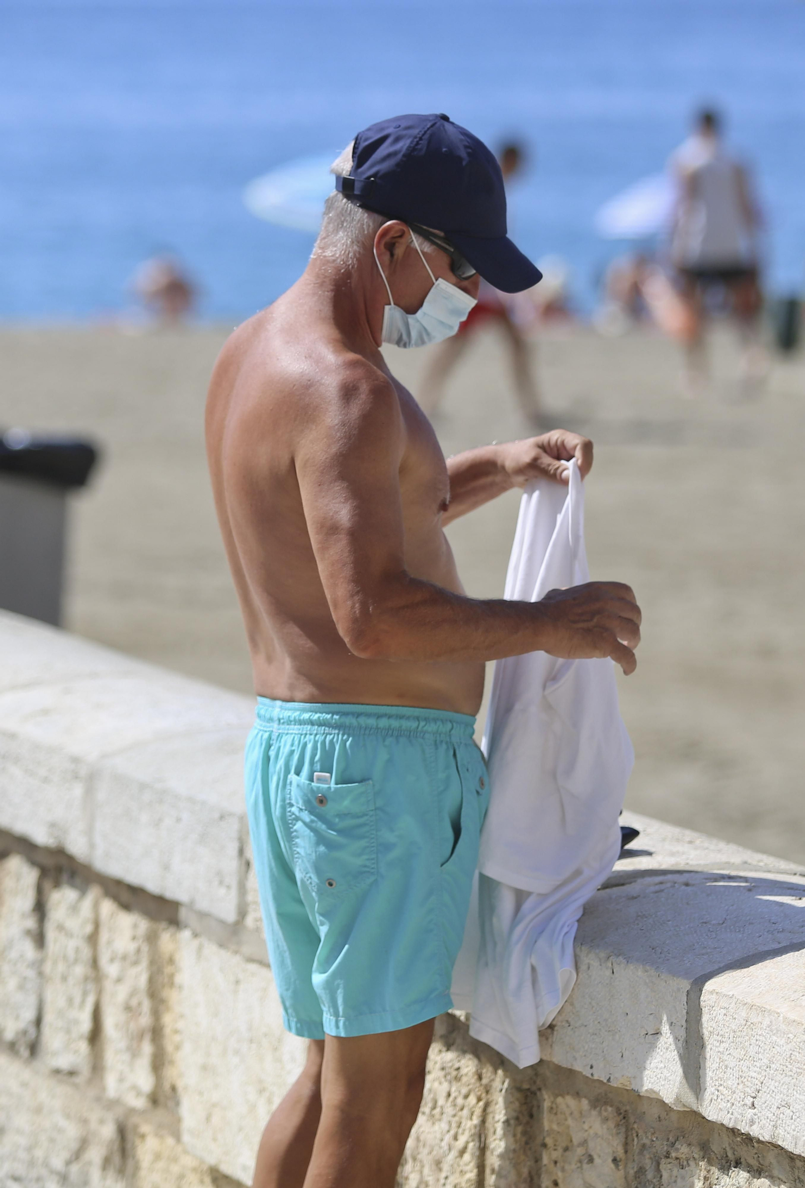 Fotos del primer día de mascarillas obligatorias en las playas y el Centro de Málaga
