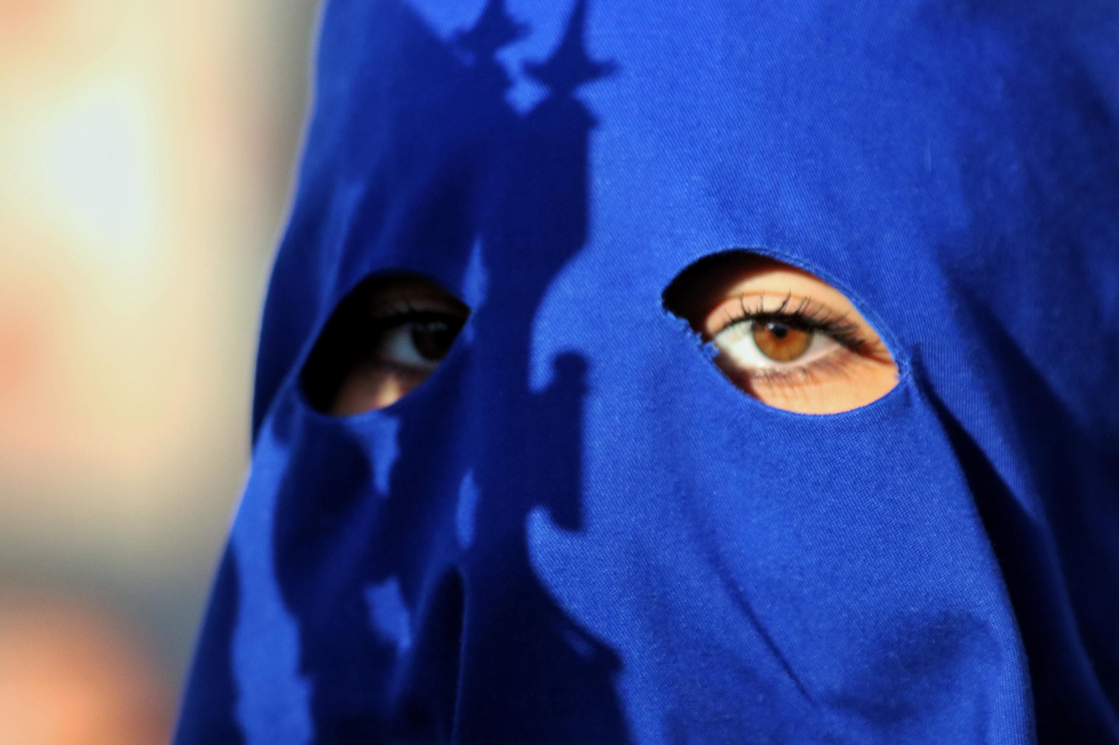 Fusionadas en su procesión del Miércoles Santo en Málaga, en fotos