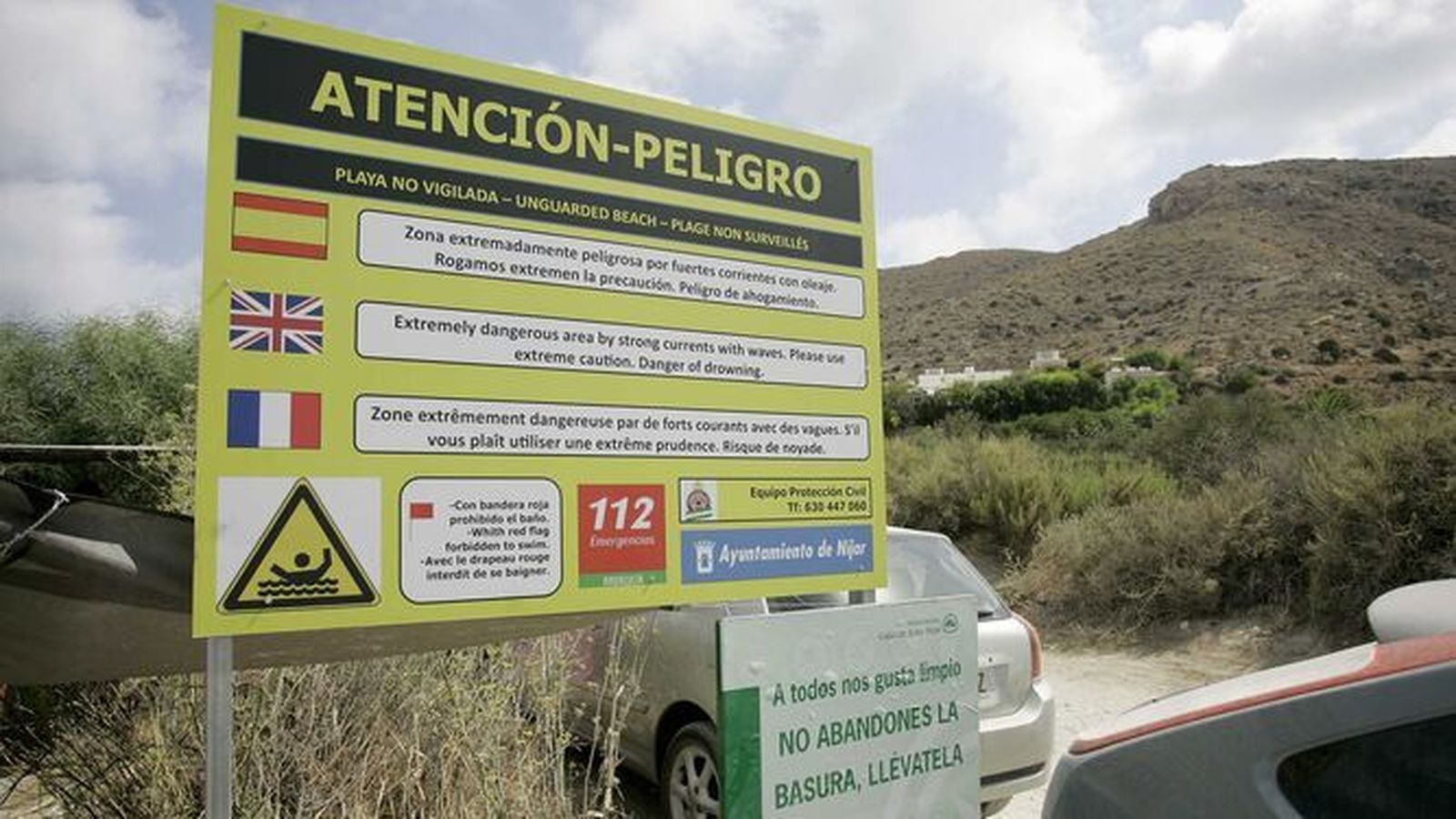 Cartel de advertencia sobre los riesgos del baño.