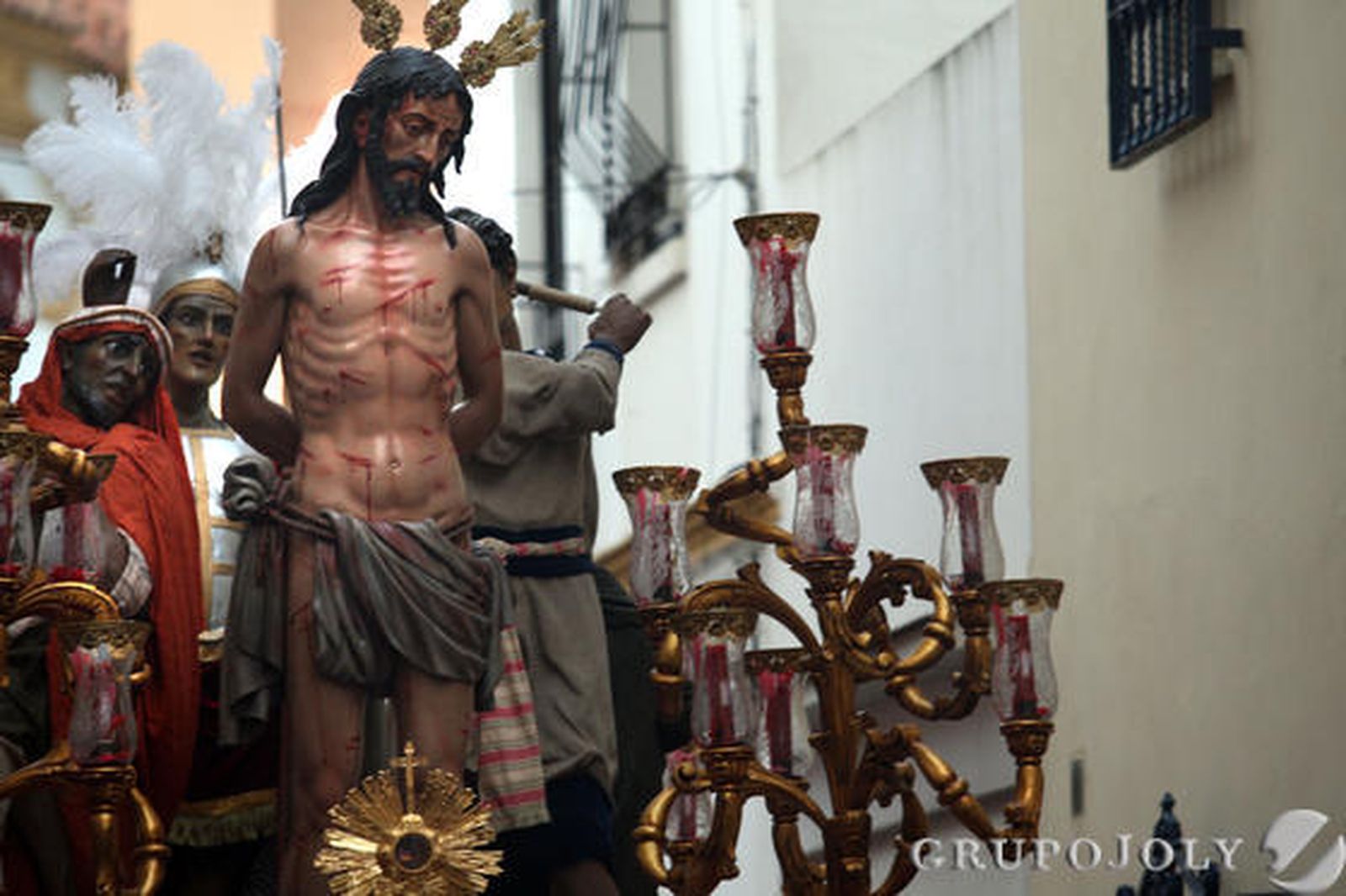 Flagelación y La Estrella por las calles de La Línea.

Foto: Paco Guerrero
