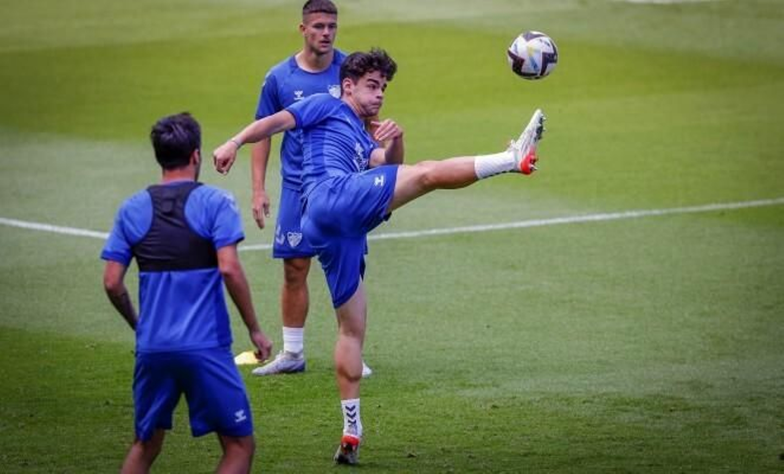 Rafa, Andrés Caro y Escassi de espaldas