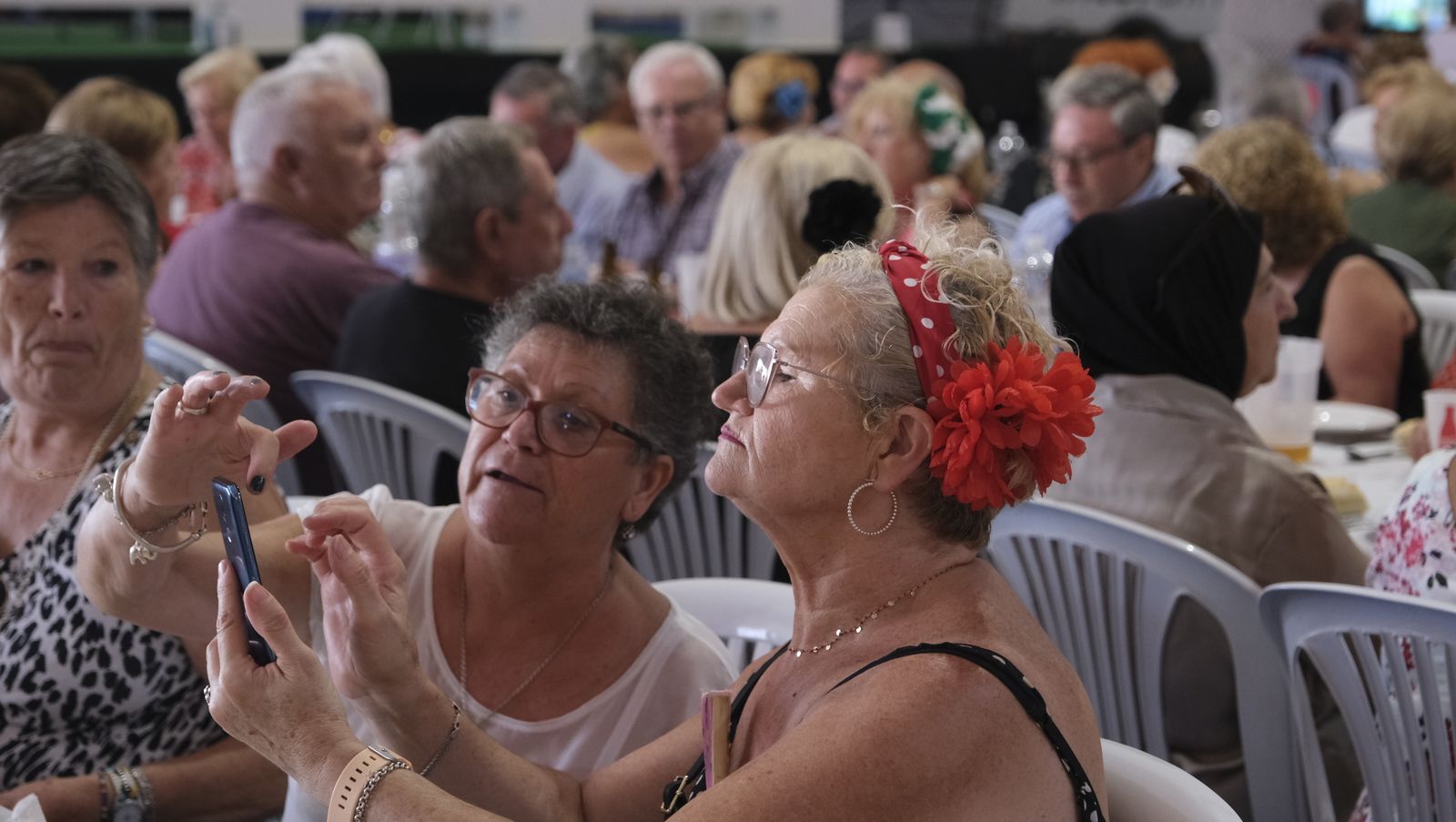 Imágenes de la comida homenaje a los mayores en la Caseta Municipal de la Feria de Almería 2022
