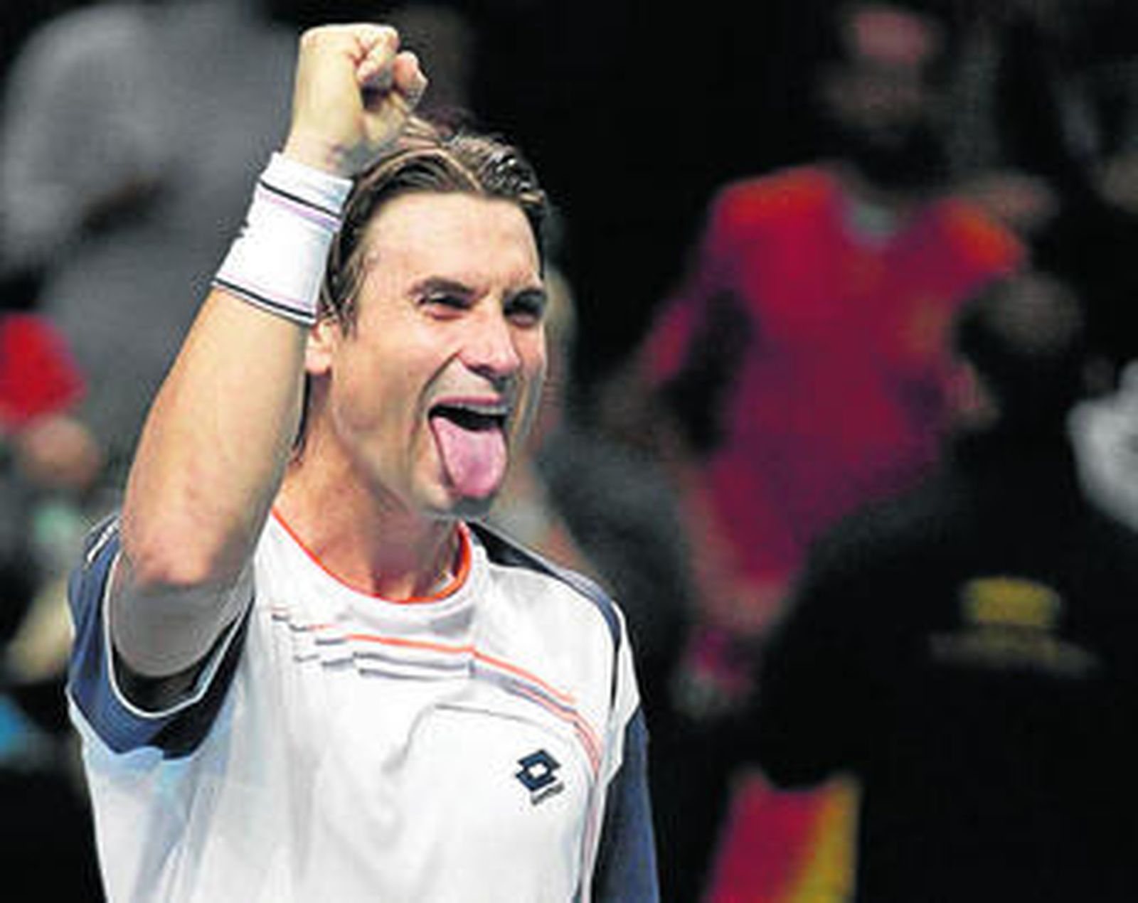 Ferrer celebra su victoria ante Djokovic en la Copa Masters.