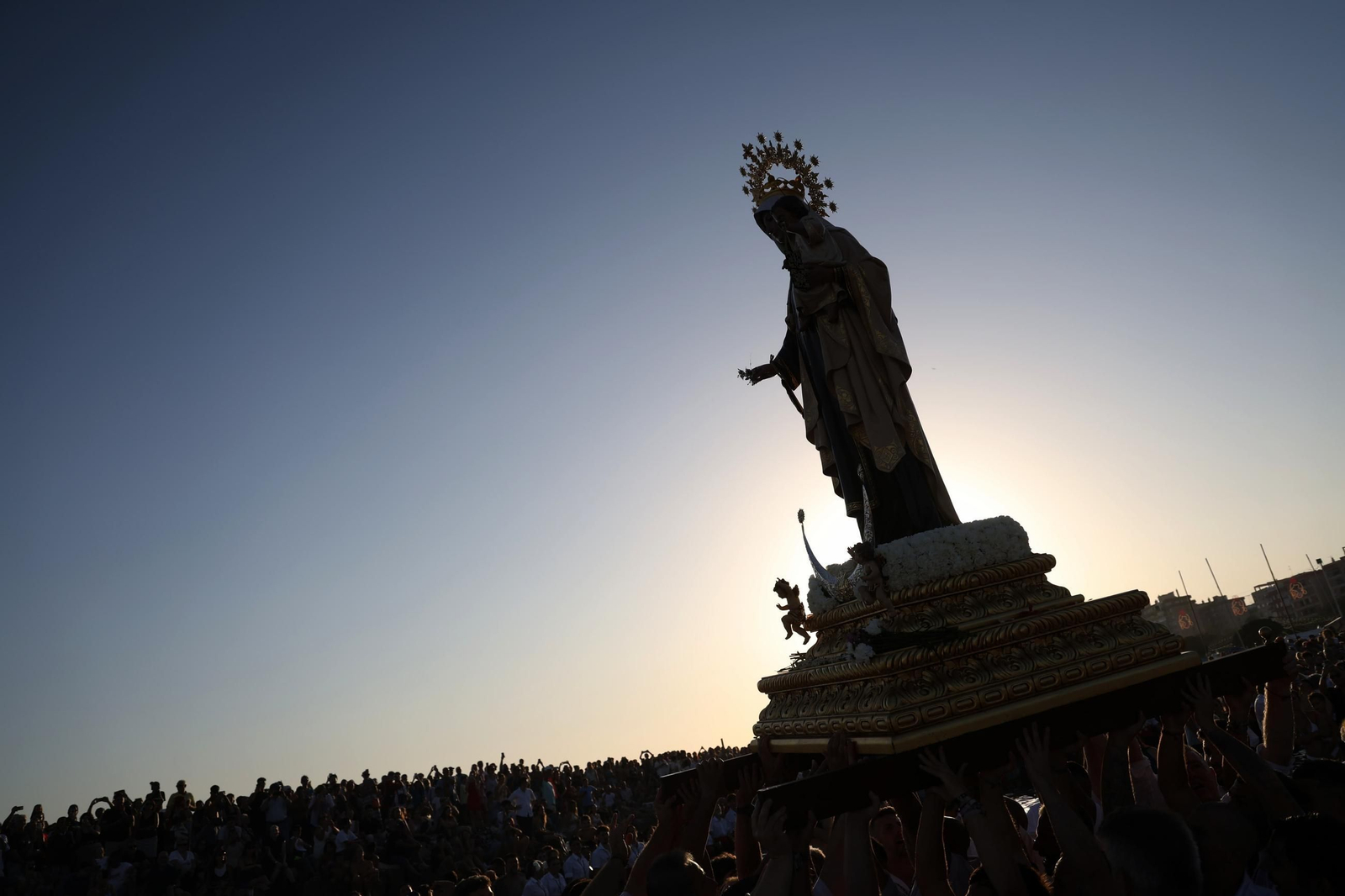La procesión de la Virgen del Carmen en El Palo, en Málaga, en imágenes