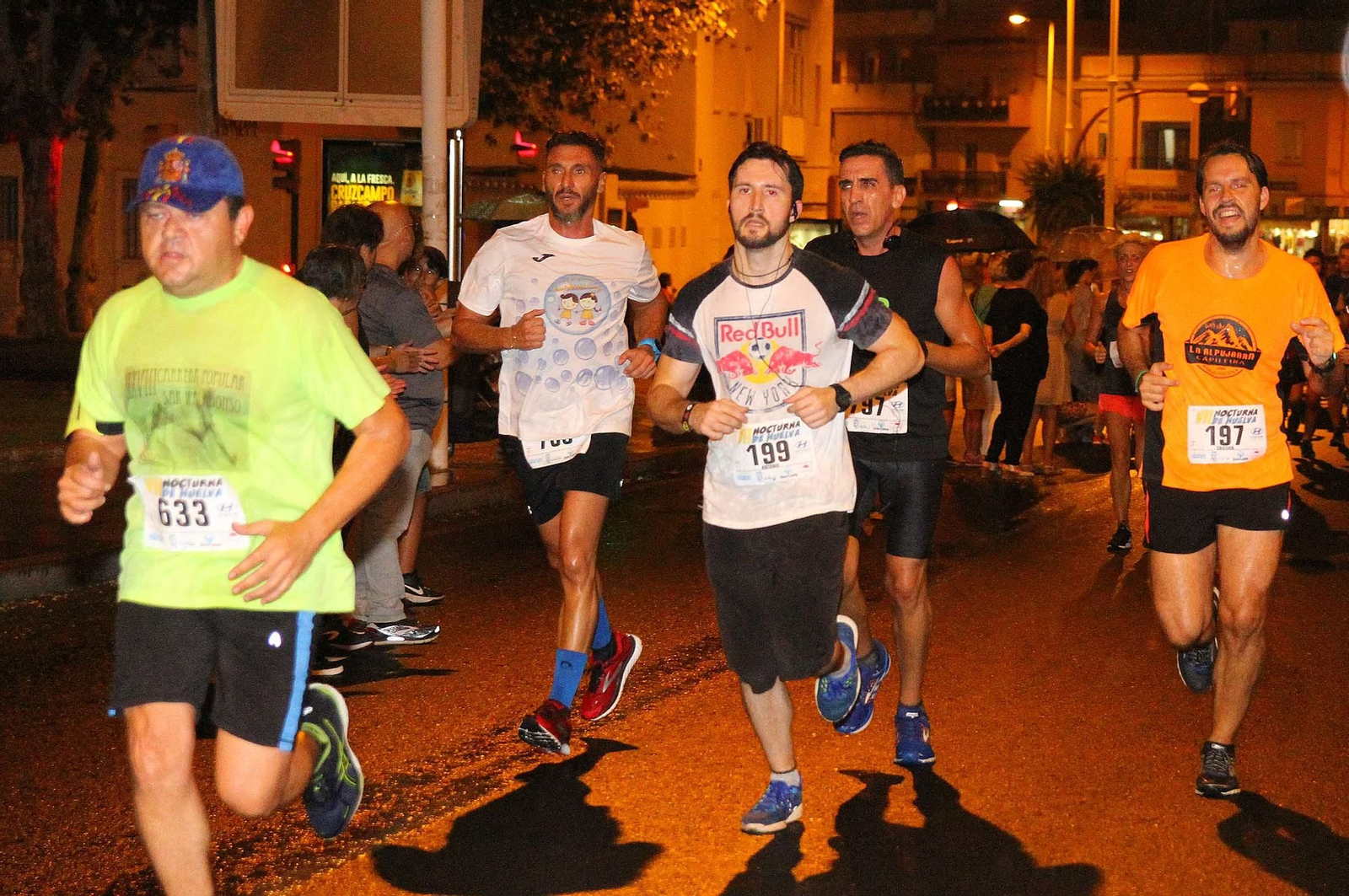 La VII Carrera Nocturna de Huelva en imágenes