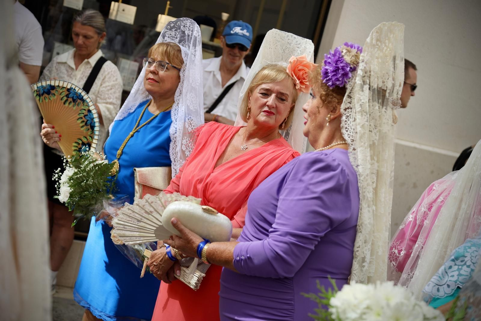 La misa estacional y el pasacalles previo a la procesión de la Victoria en Málaga, en imágenes