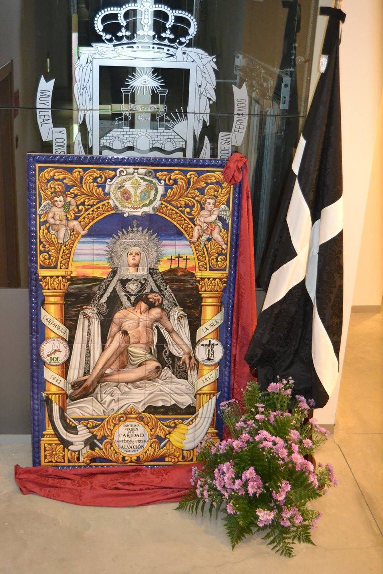 El azulejo de la Caridad.