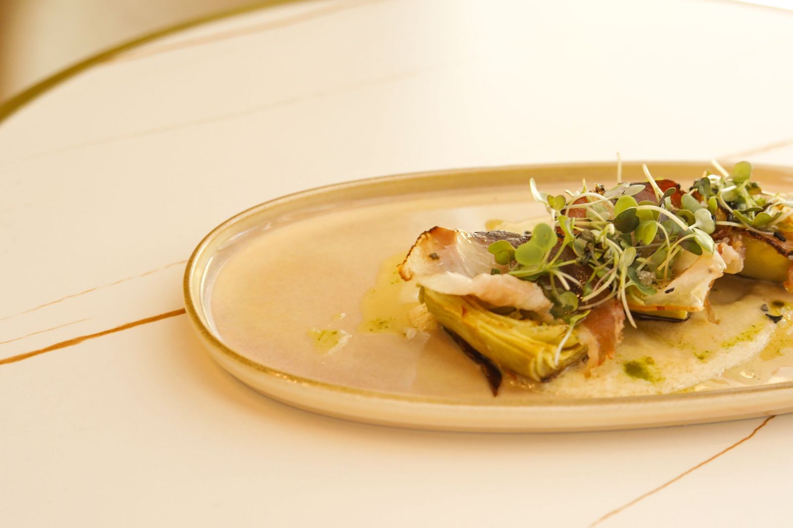 Alcachofa confitada.