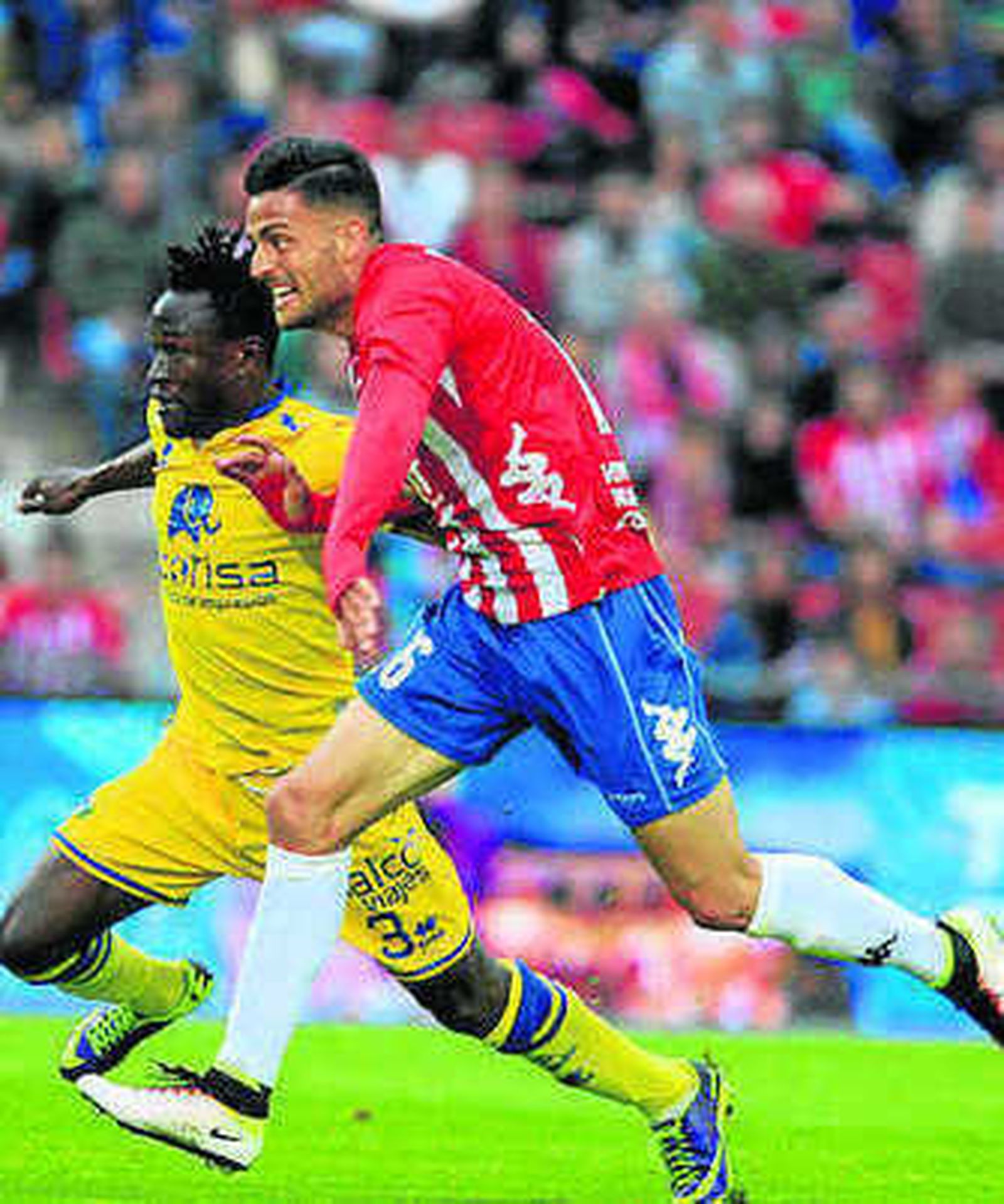 Cristian Herrera, con Djené.