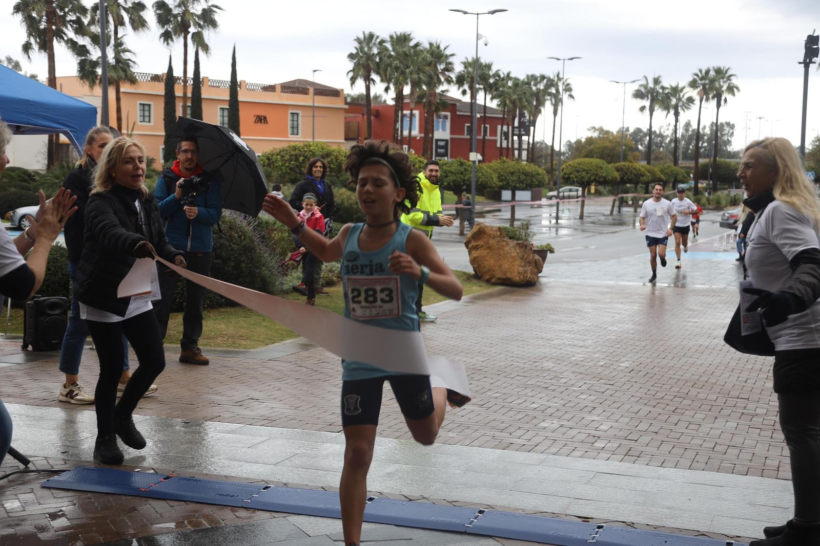 La Carrera por el Día Internacional de la Mujer en Málaga, en fotos