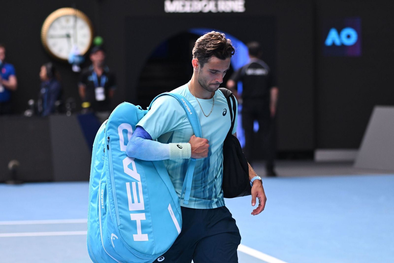 Las fotos de la retirada de Musetti ante Djokovic y del resto de cuartos de final