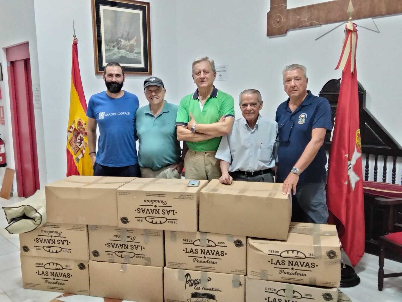 Entrega del material donado por Caballeros Hospitalarios a Madre Coraje.