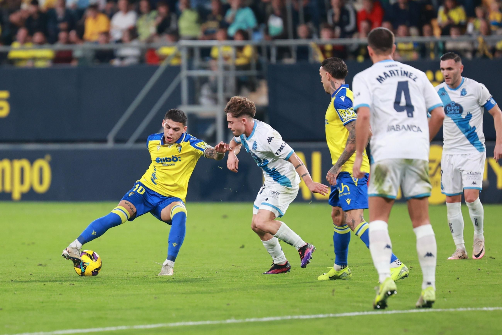 Búscate entre las imágenes del partido de fútbol entre Cádiz CF y Deportivo