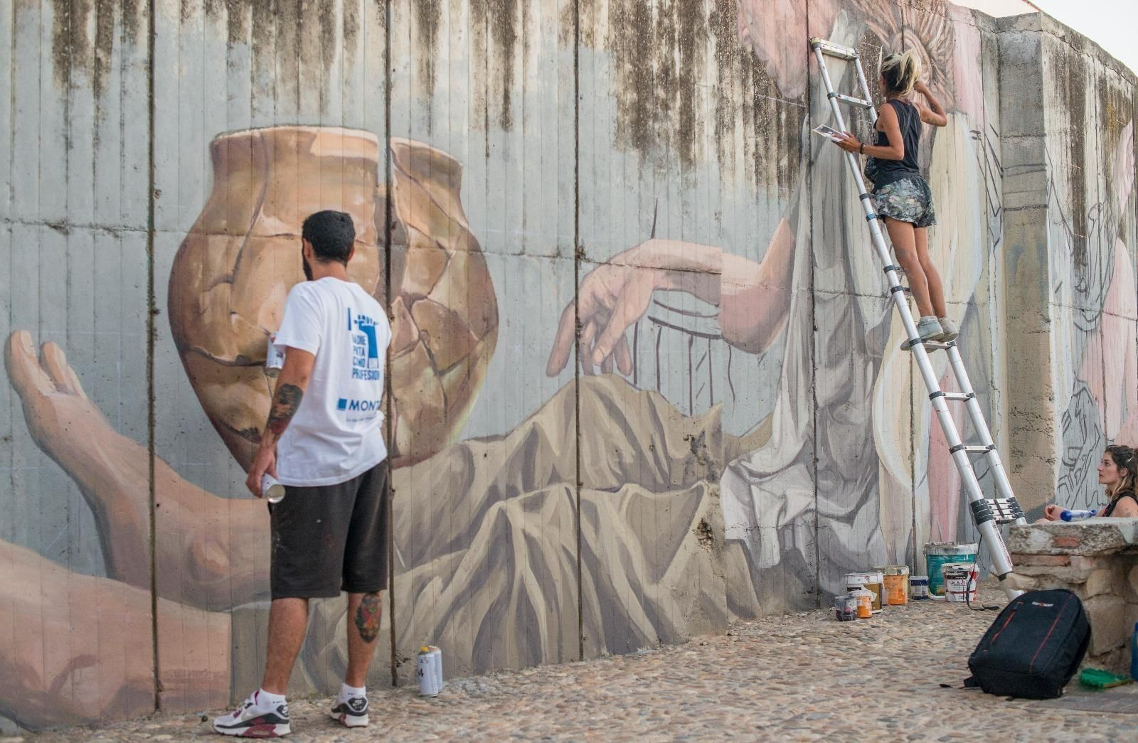 Muralistas en Baena.