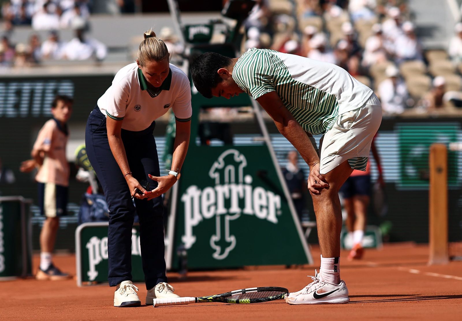 Carlos Alcaraz. tras lesionarse en el tercer set ante Djokovic.