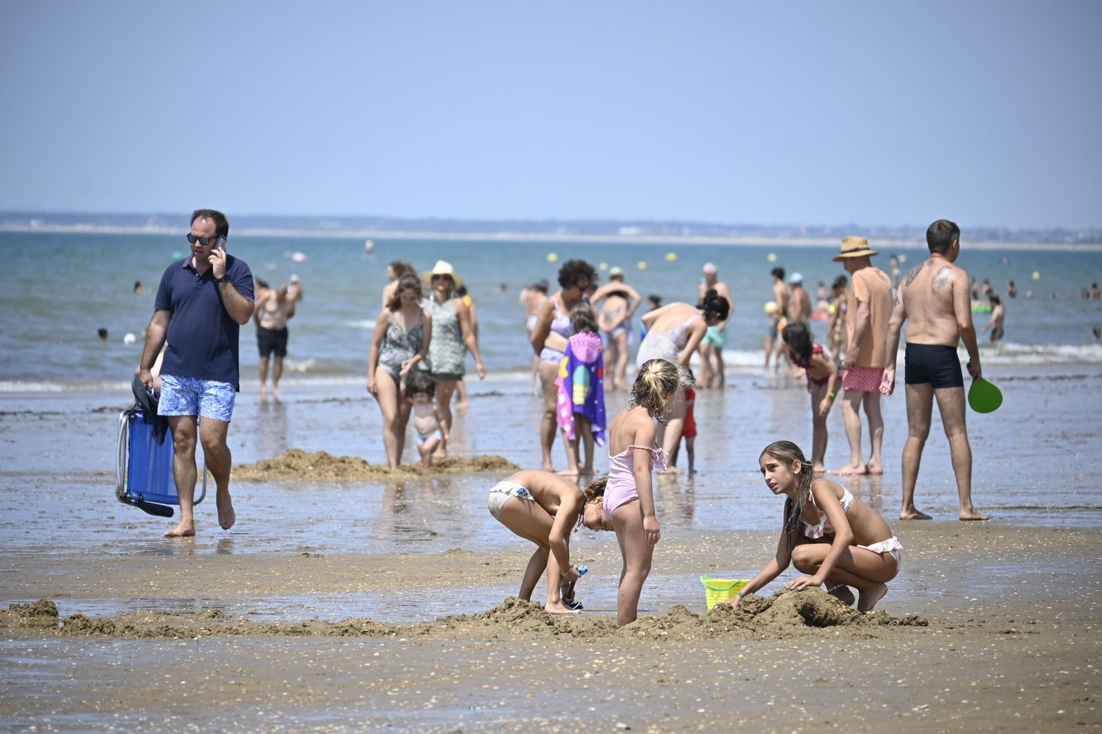 Ambiente en la playas de Huelva este sábado 22 de julio, en imágenes