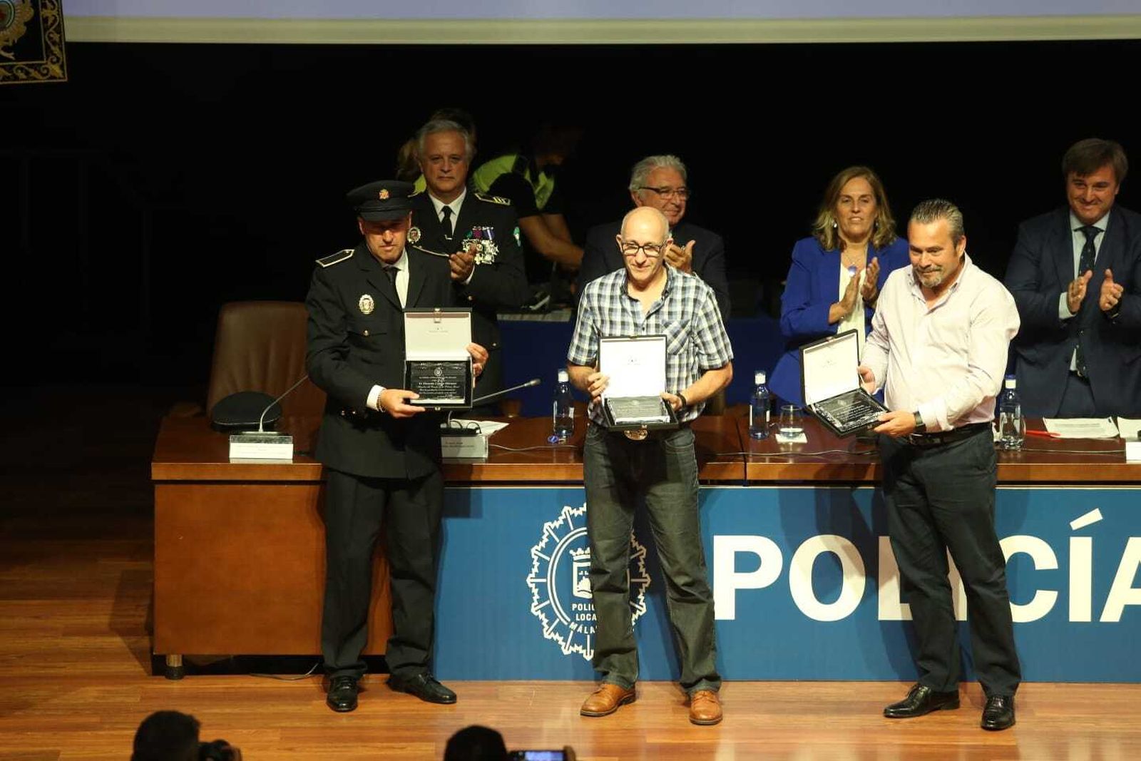 Las imágenes del acto de distinción de agentes de la Policía Local de Málaga en el día de su patrón