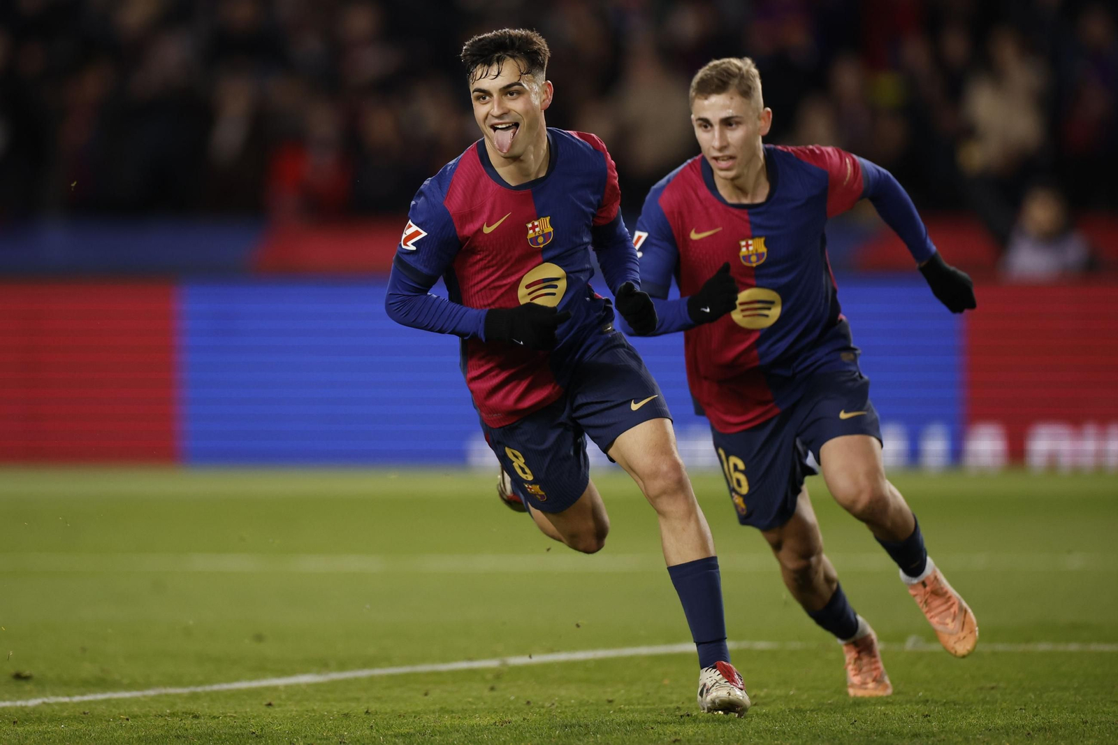 Una imagen de un partido entre Barcelona y Atlético de Madrid