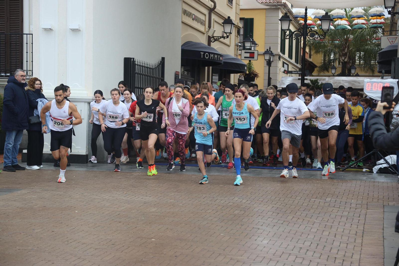 La Carrera por el Día Internacional de la Mujer en Málaga, en fotos