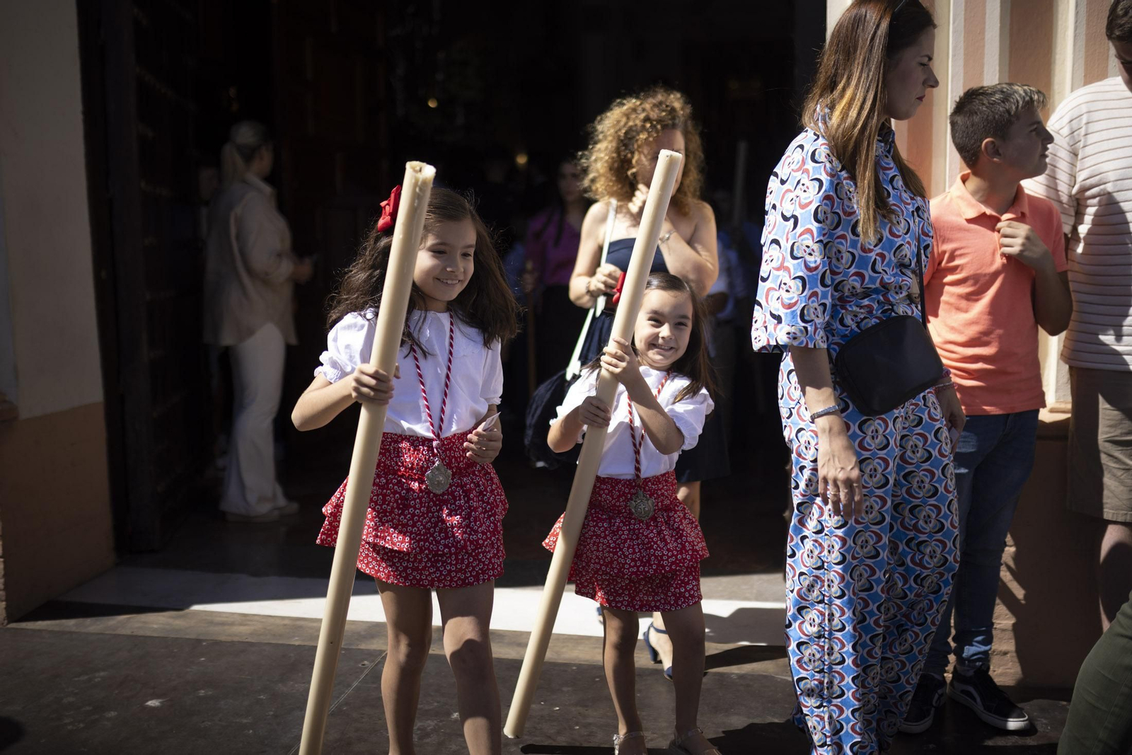 Imágenes de la salida extraordinaria de La Borriquita por las calles de Huelva