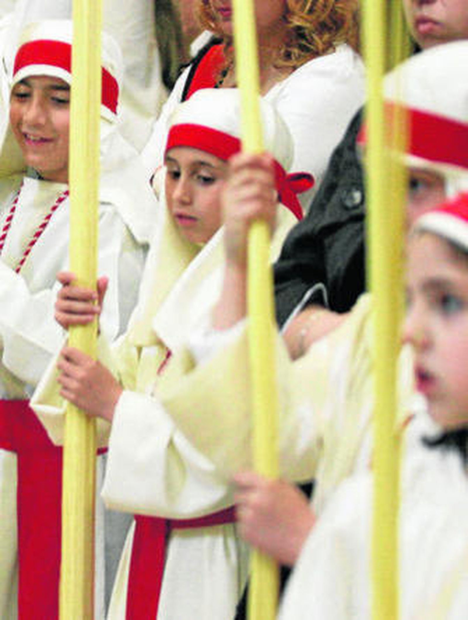 Niños vestidos de hebreo en el cortejo de la Borriquita.