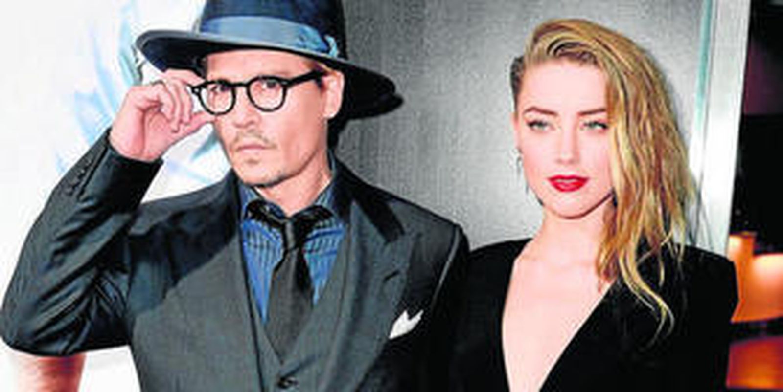 Johnny y Amber llegan a un acuerdo de divorcio