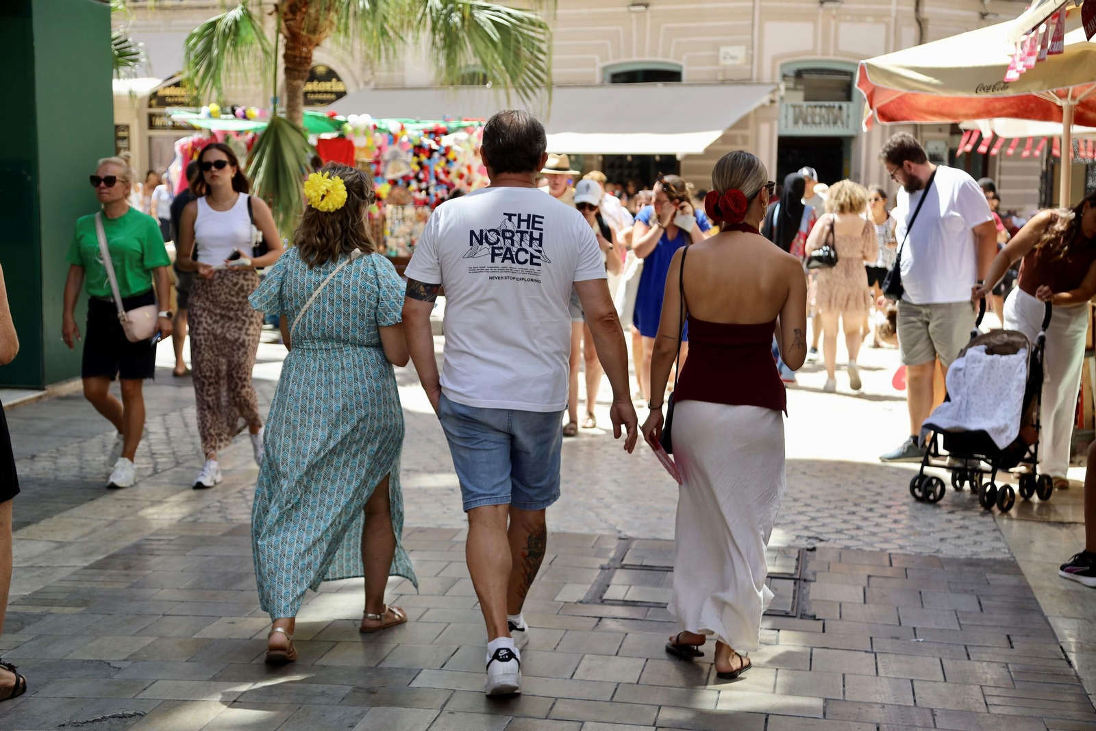 El miércoles de Feria en el Centro de Málaga, en imágenes