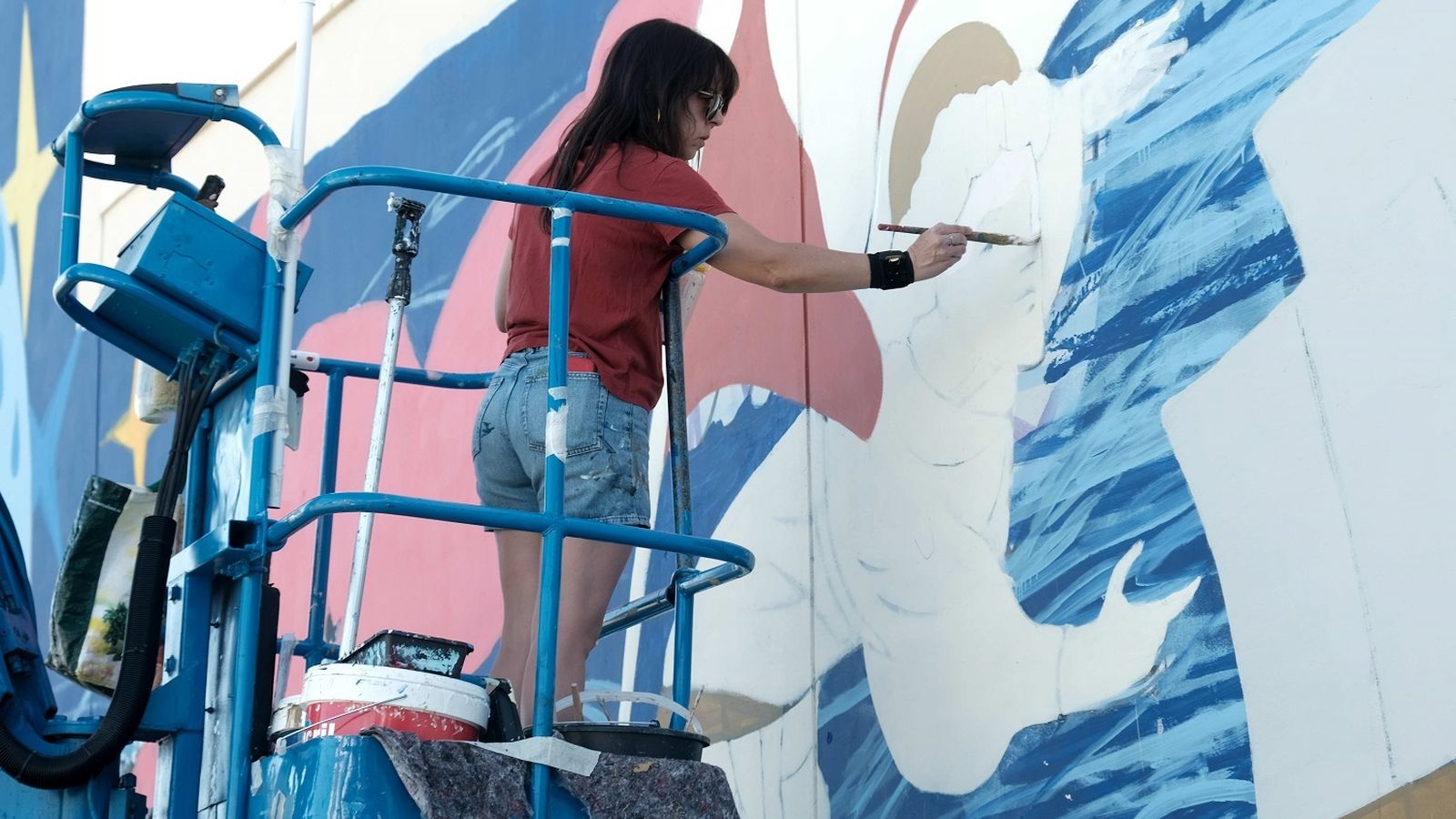 Un momento de la ejecución del mural.