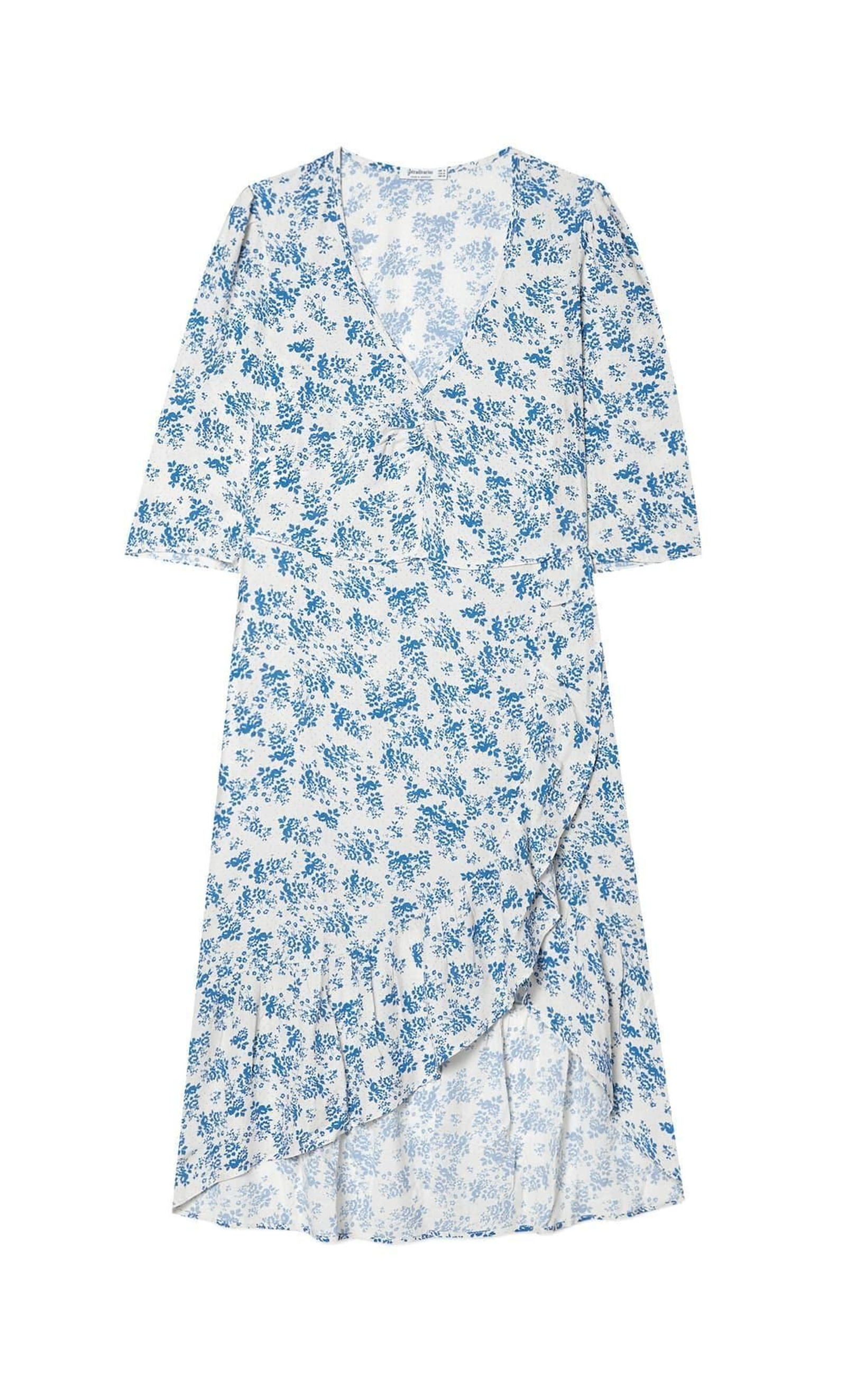 Vestido midi con volante de Stradivarius. Vestido midi con volante de Stradivarius.