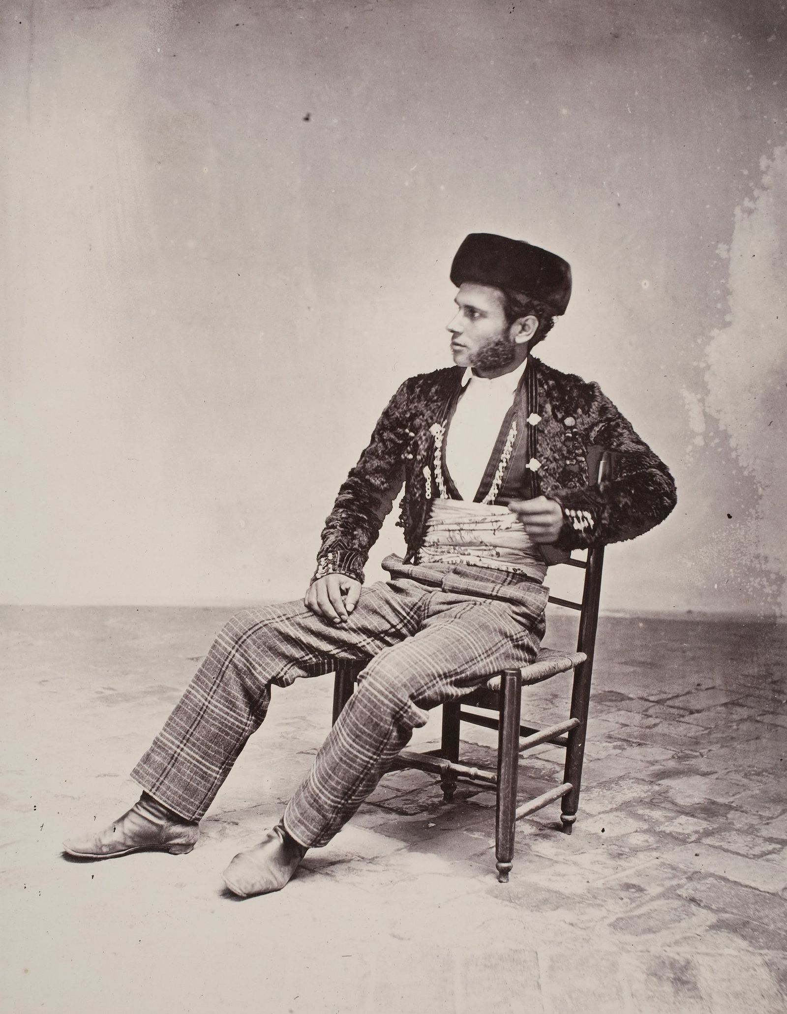 Seville, Gypsy boy dressed as a 'majo'. c. 1862.