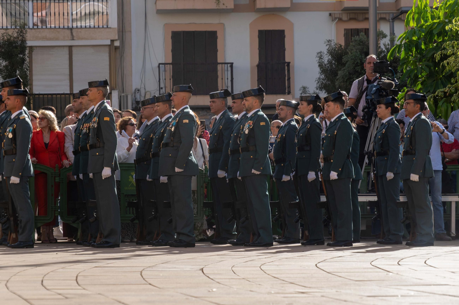 Imágenes del desfile de la Guardia Civil en el Día de la Hispanidad y de su patrona en la Plaza de La Merced