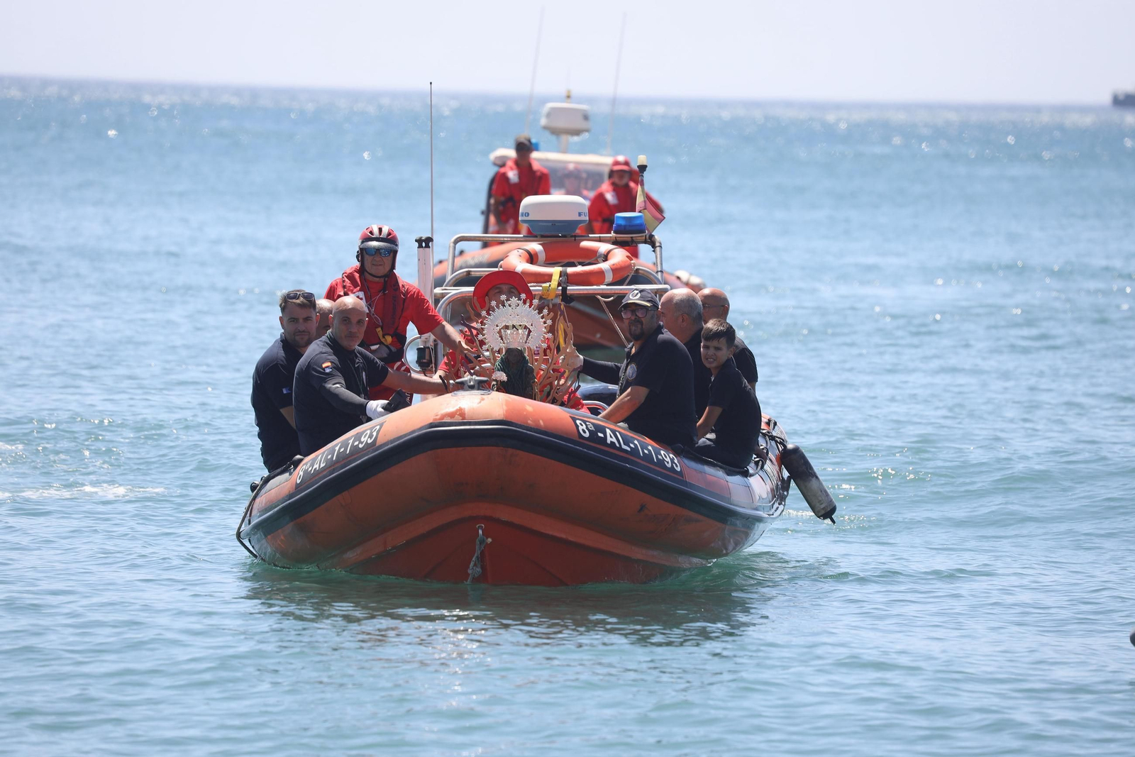 La procesión en Málaga de la Virgen del Carmen de los submarinistas, en imágenes