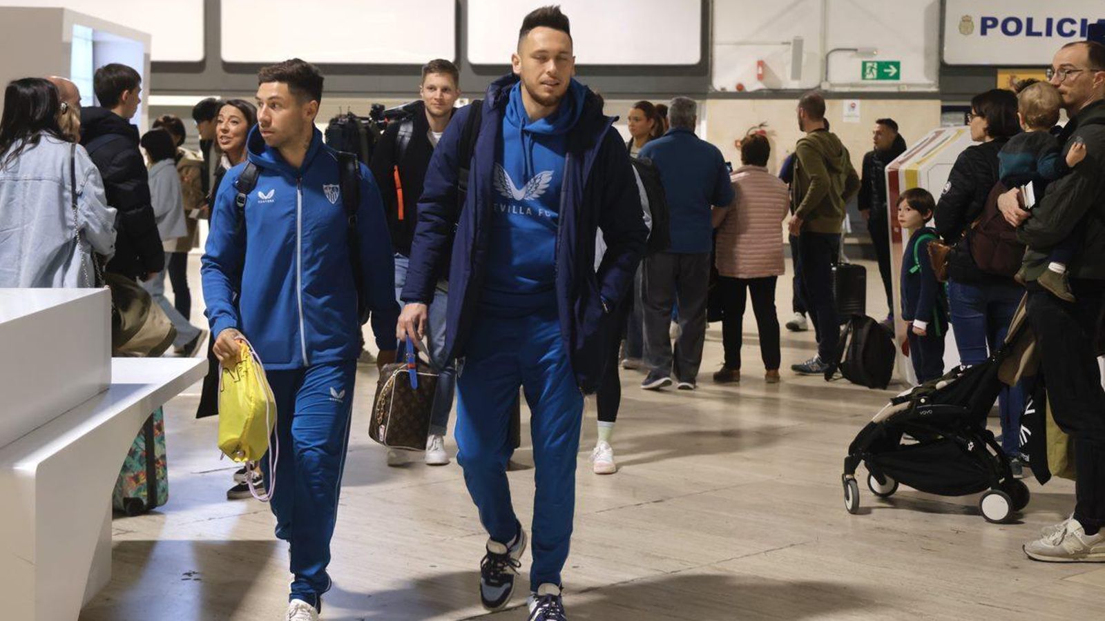 Ocampos y Montiel se dirigen a la zona de embarque del aeropuerto de San Pablo.