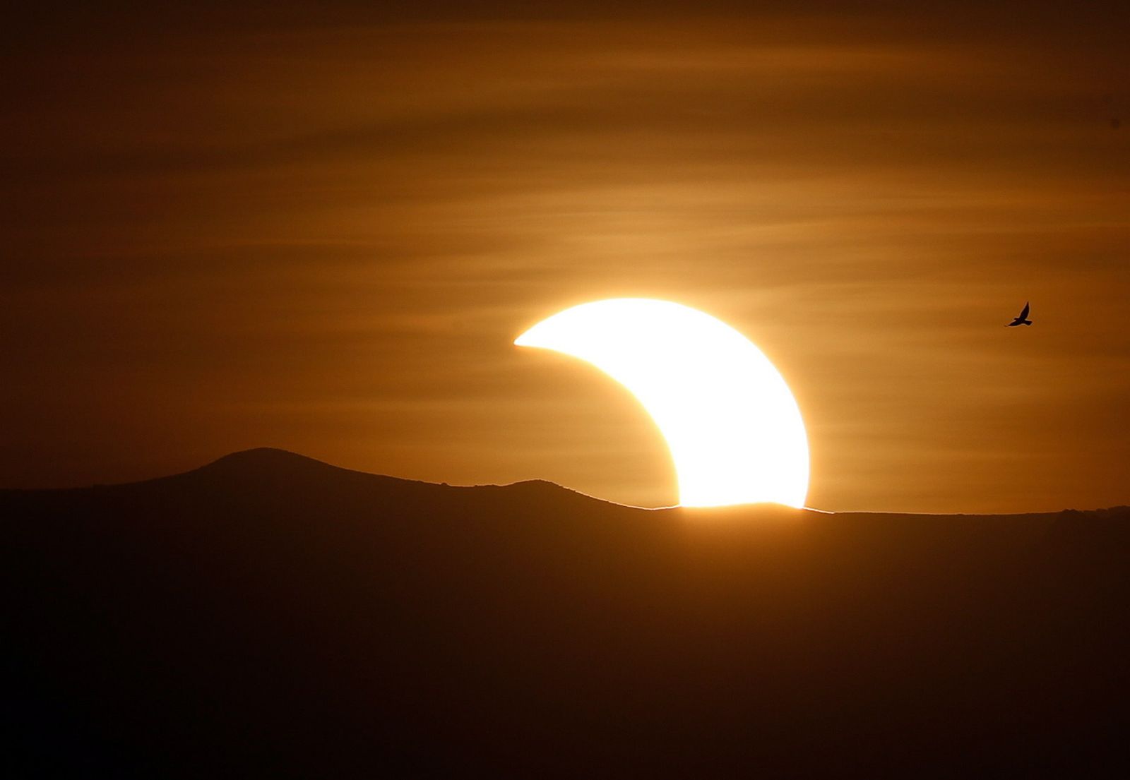 Las imágenes del último eclipse solar de la década
