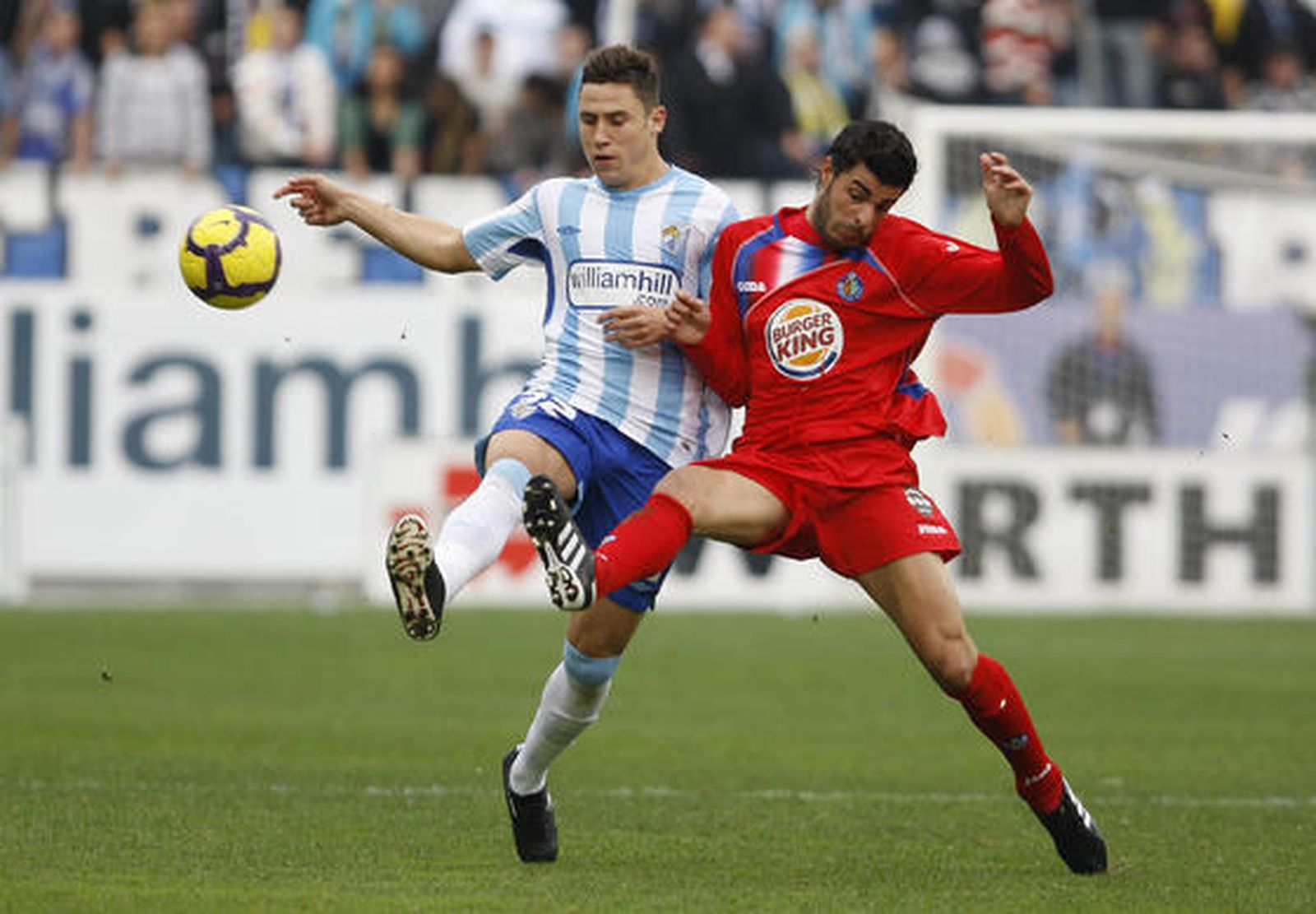 El Málaga respira tras su victoria en Liga ante el Getafe. / Sergio Camacho