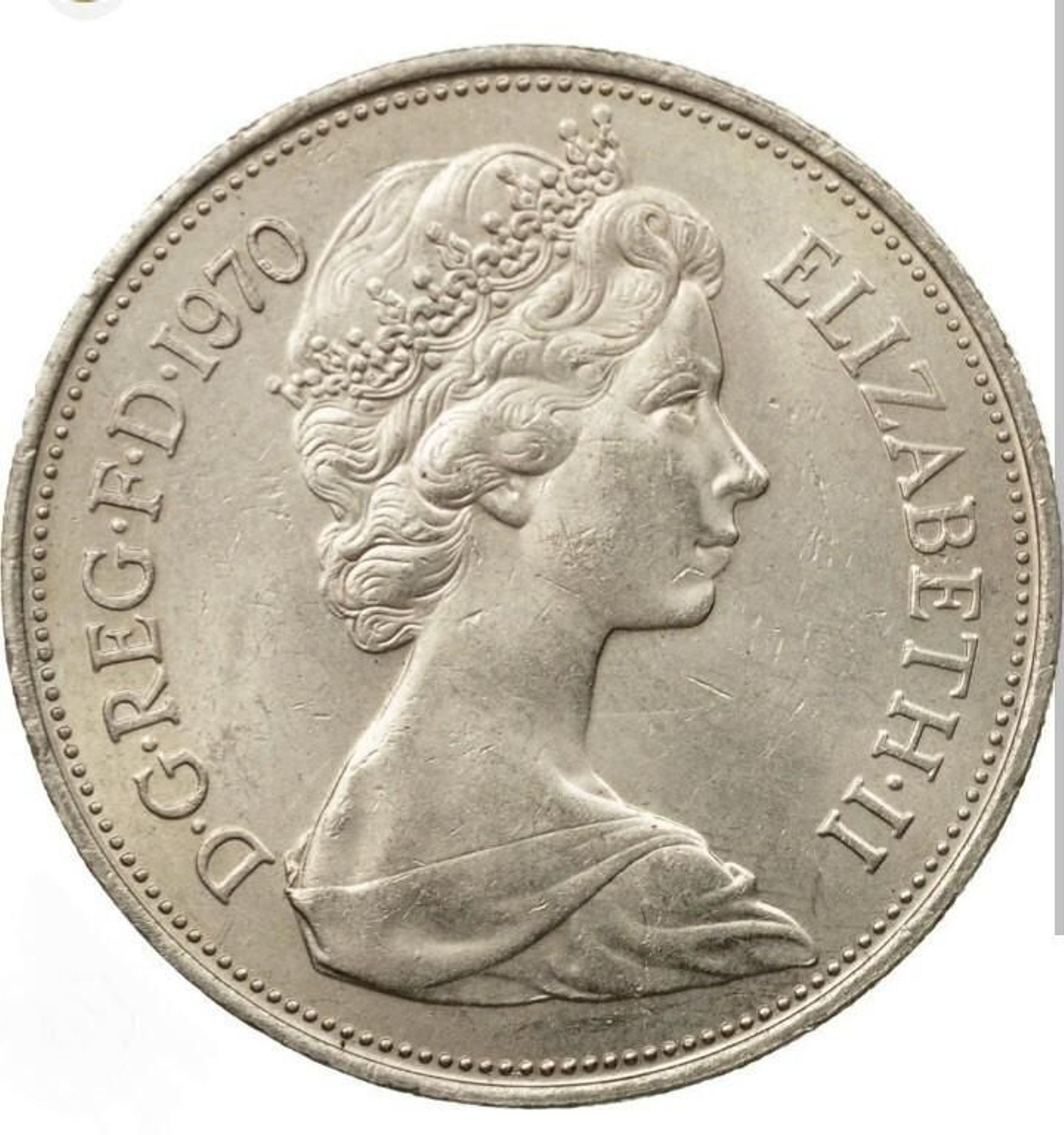 Una moneda con la efigie de Isabel II