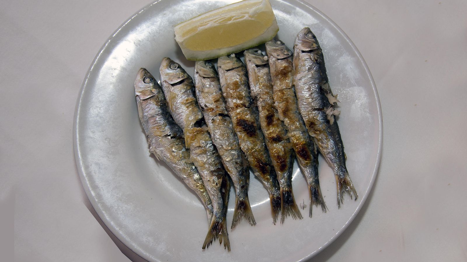 Espeto de sardinas.