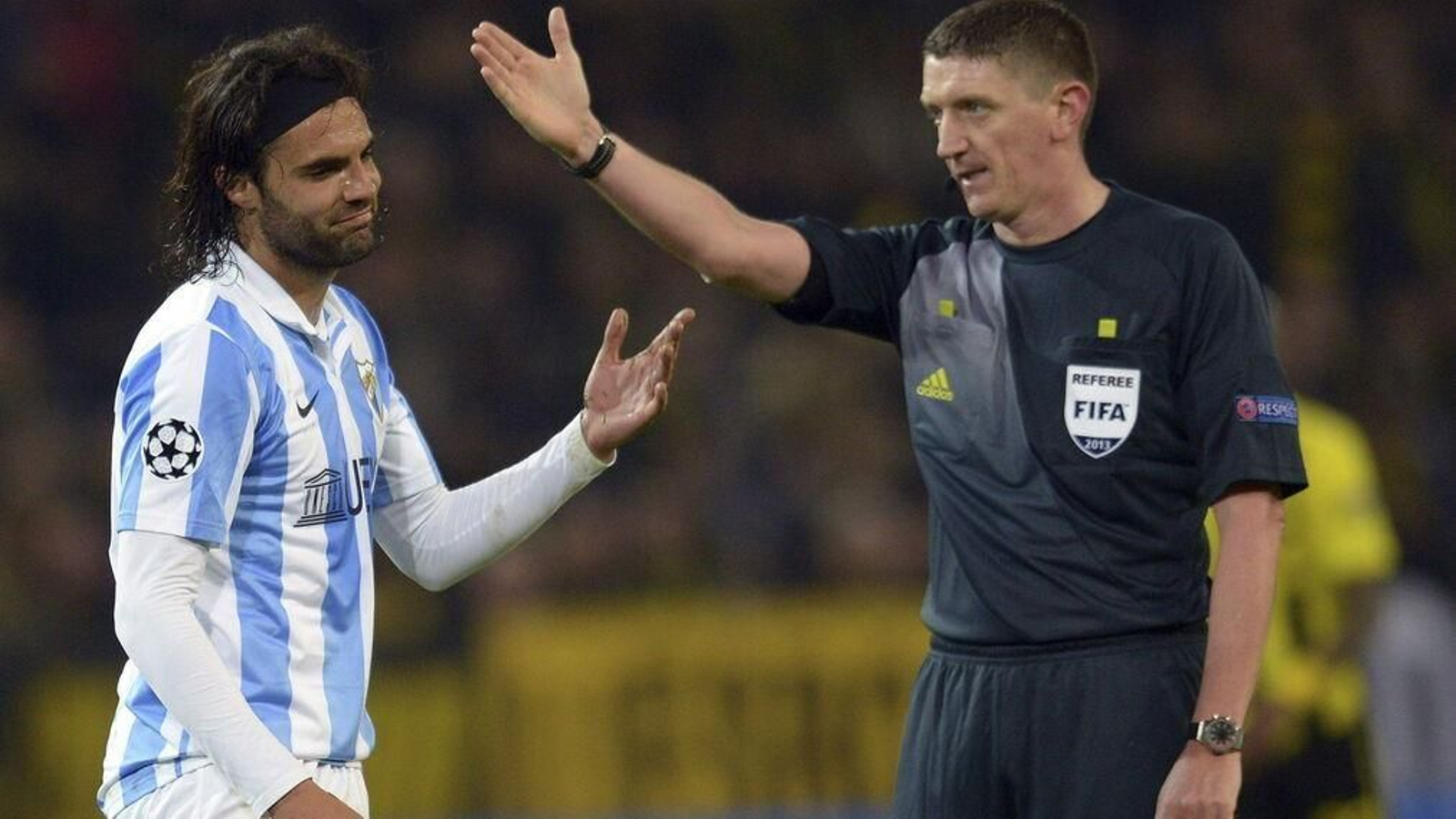 Las imágenes del Borussia Dortmund-Málaga, que cumple siete años.