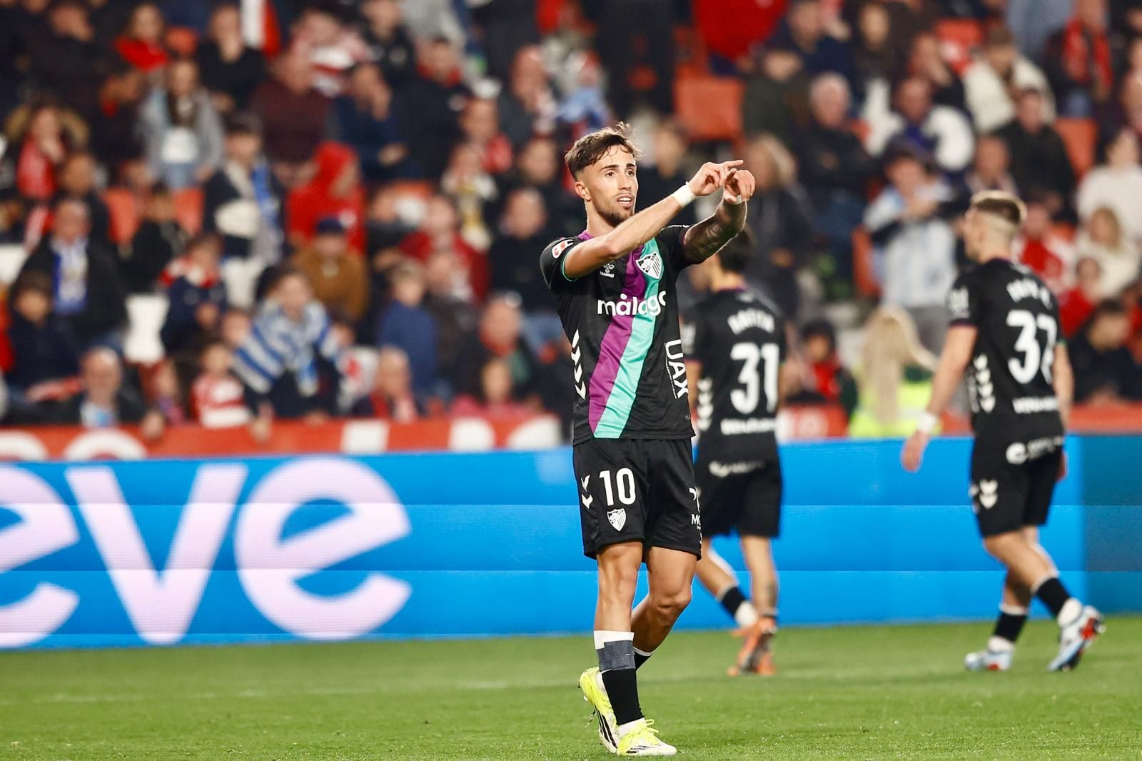 El Granada-Málaga CF, en fotos