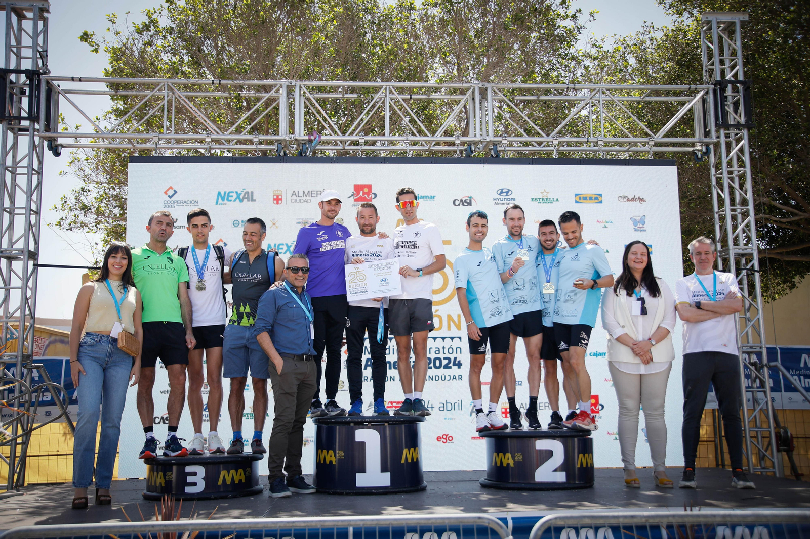 Imágenes de los premiados en la Media maratón de la Cuidad de Almería