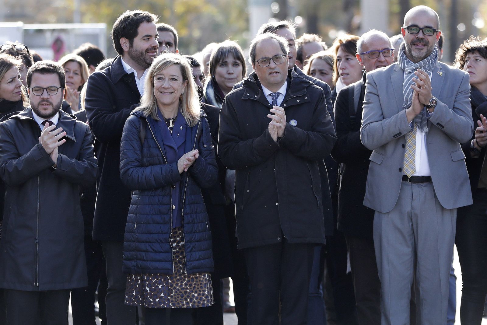 Aragonés, Lloveras, Torra y Buch aplauden a las puertas del TSJC.